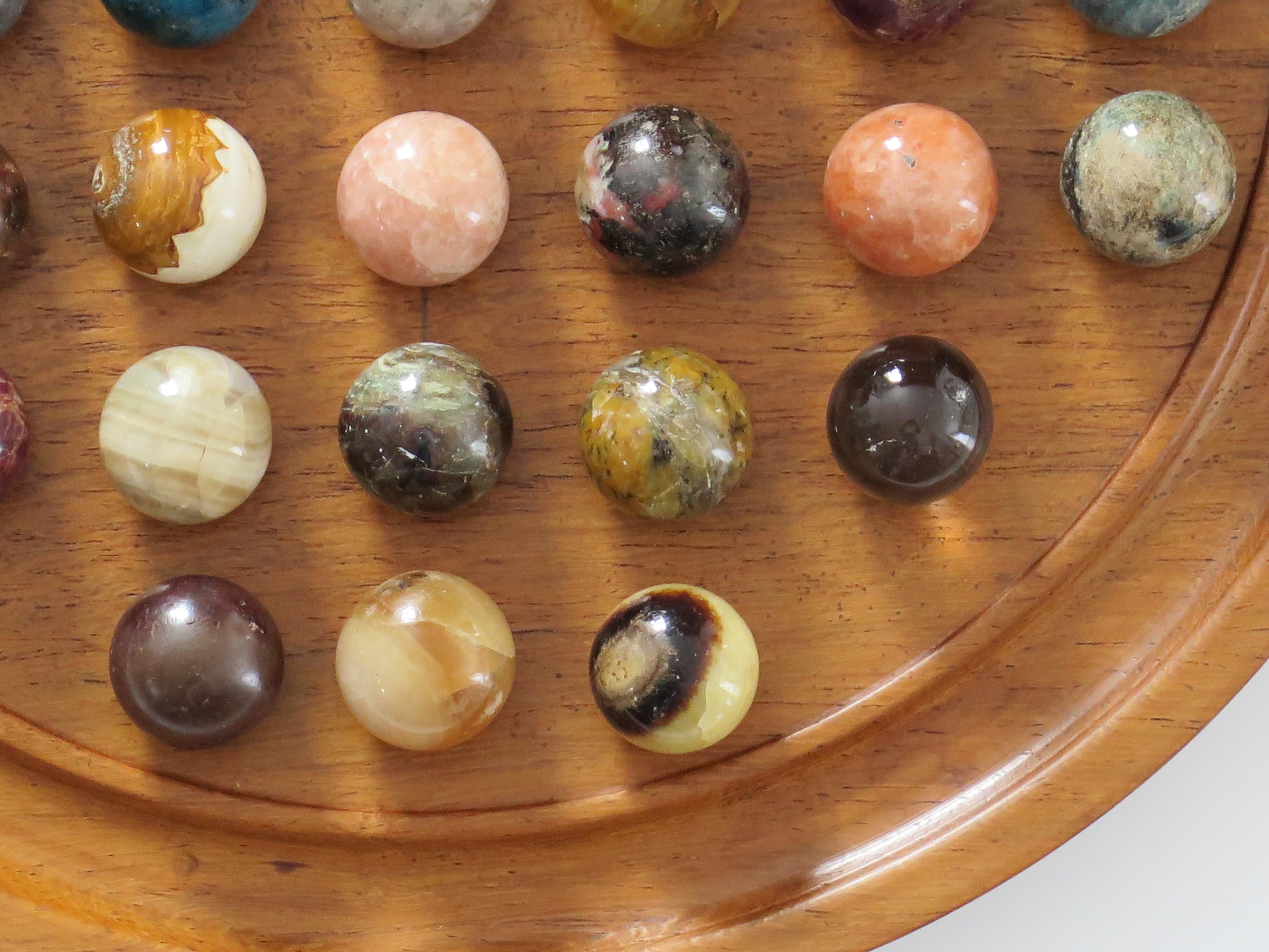 Marble Solitaire Game Hardwood Board with 38 Mineral Stone Marbles, French 1920s 4