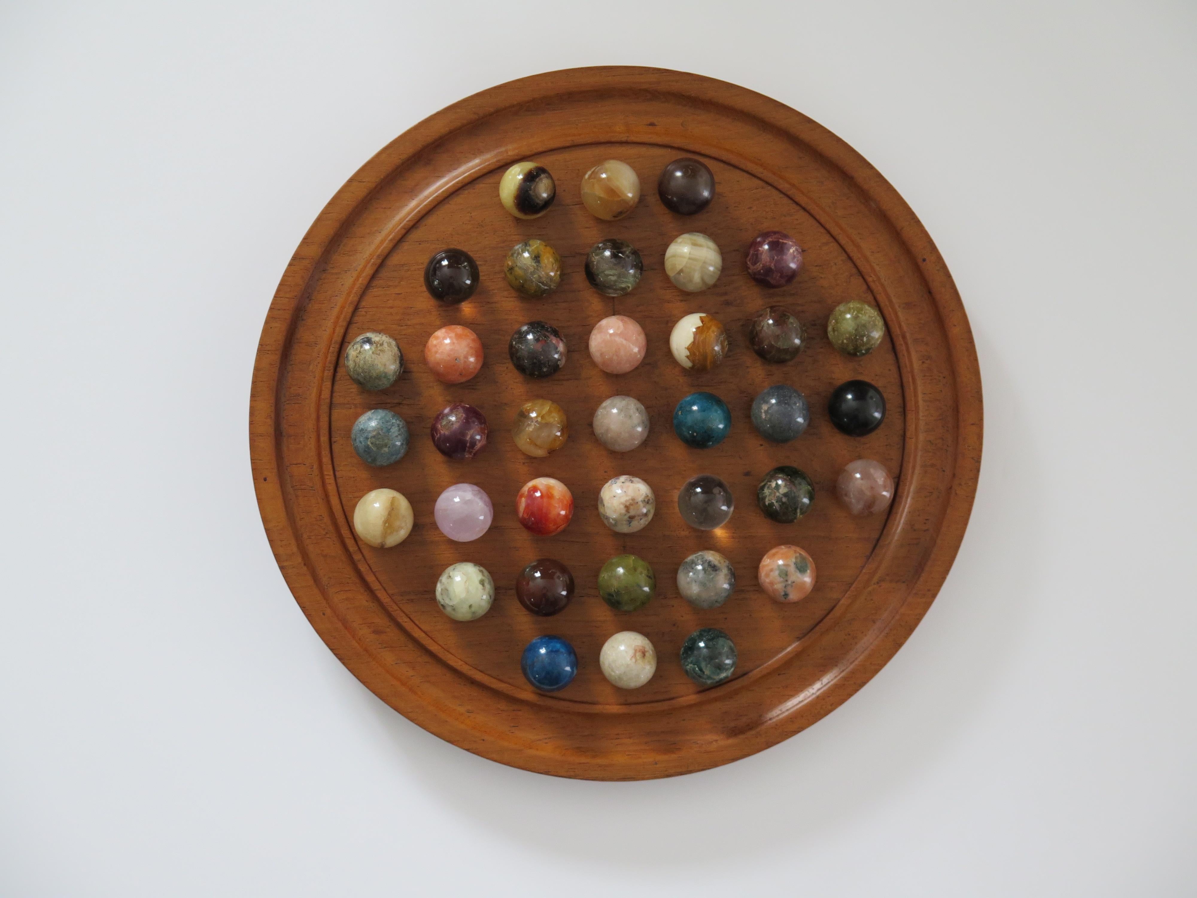 20th Century Marble Solitaire Game Hardwood Board with 38 Mineral Stone Marbles, French 1920s