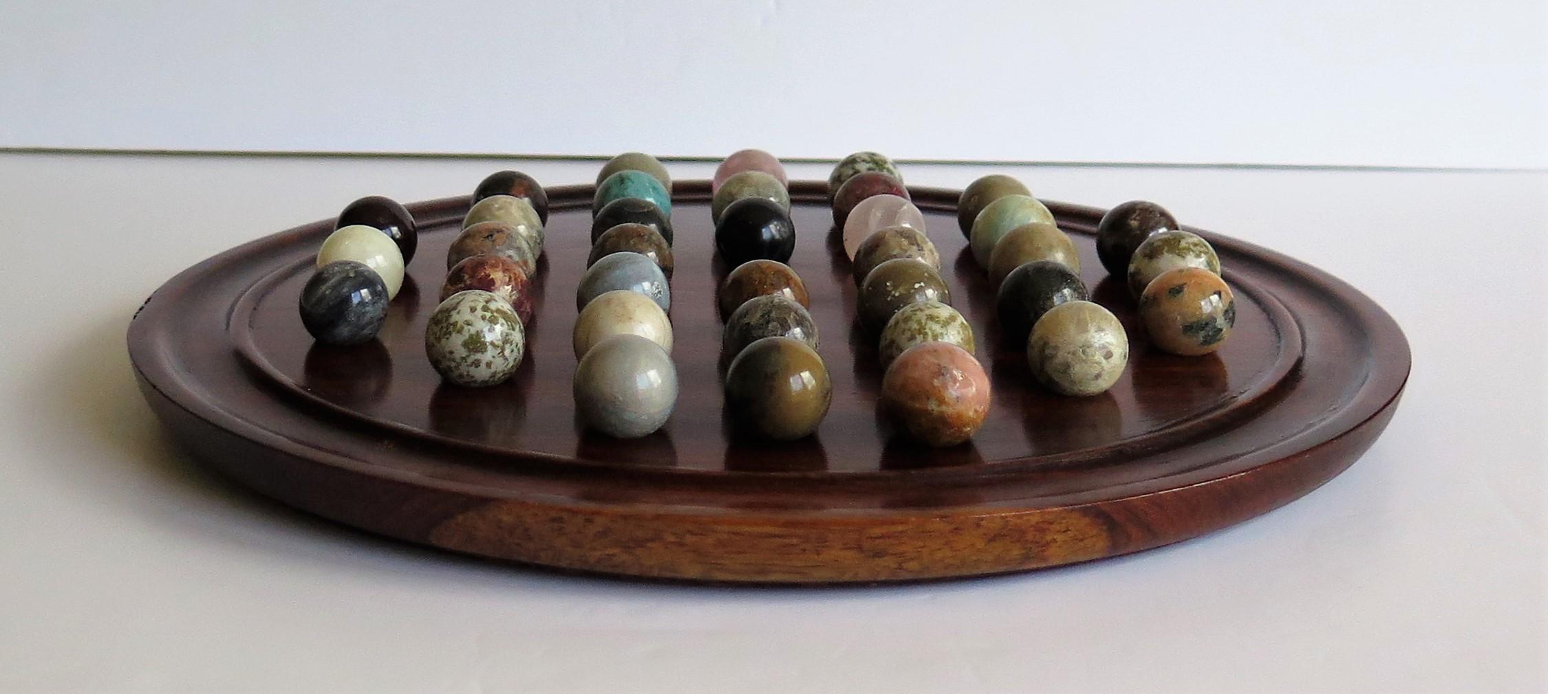 English Marble Solitaire Game Polished Hardwood Board 36 Agate Stone Marbles, circa 1915