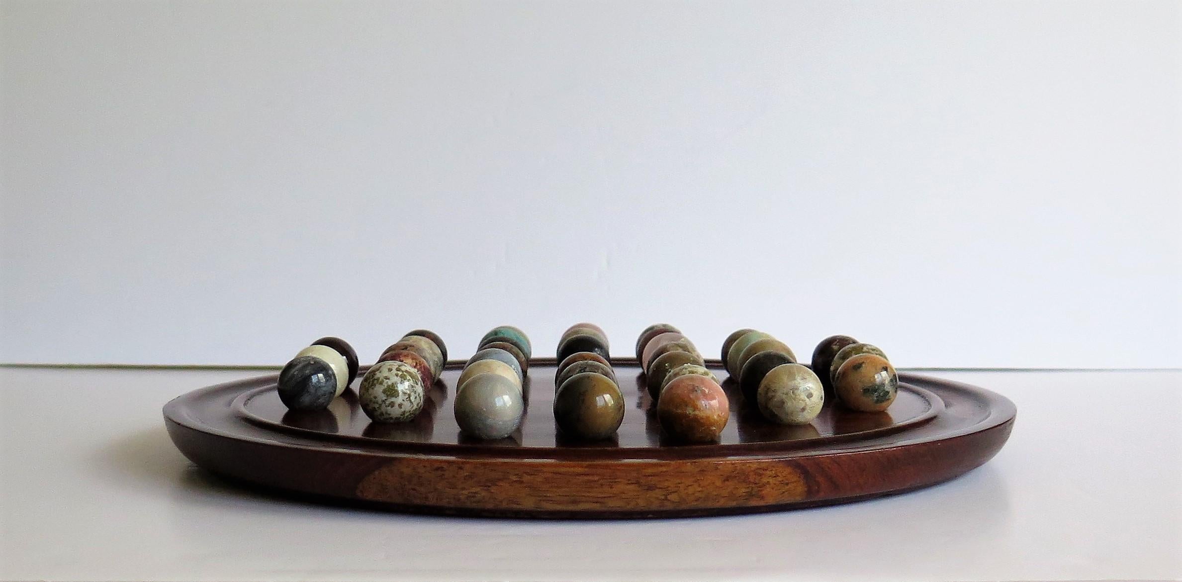 Hand-Crafted Marble Solitaire Game Polished Hardwood Board 36 Agate Stone Marbles, circa 1915