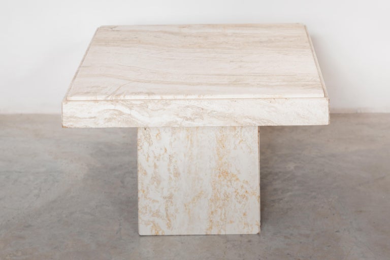 Minimalist and stylish square marble coffee table designed in Italy. Period: 1970s. Beautiful in this ecru and sand nuance color shades and veins. Considering its age in good vintage condition. Marble is completely in line with the interior trend of