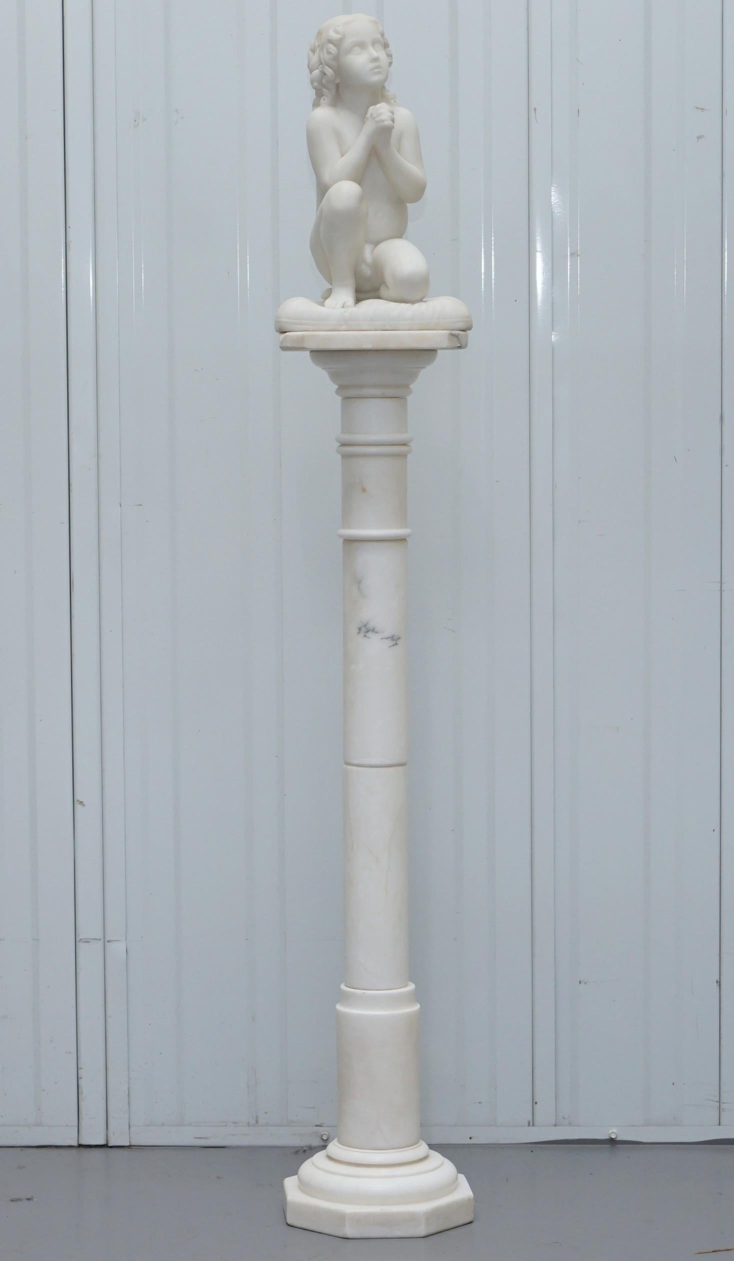 We are delighted to this stunning and really quite rare marble statue on Alabaster plinth on a kneeling praying child after the original by the great Luigi Pampaloni (1791-1847) named Samuel

An absolutely stunning piece, the look on the face of