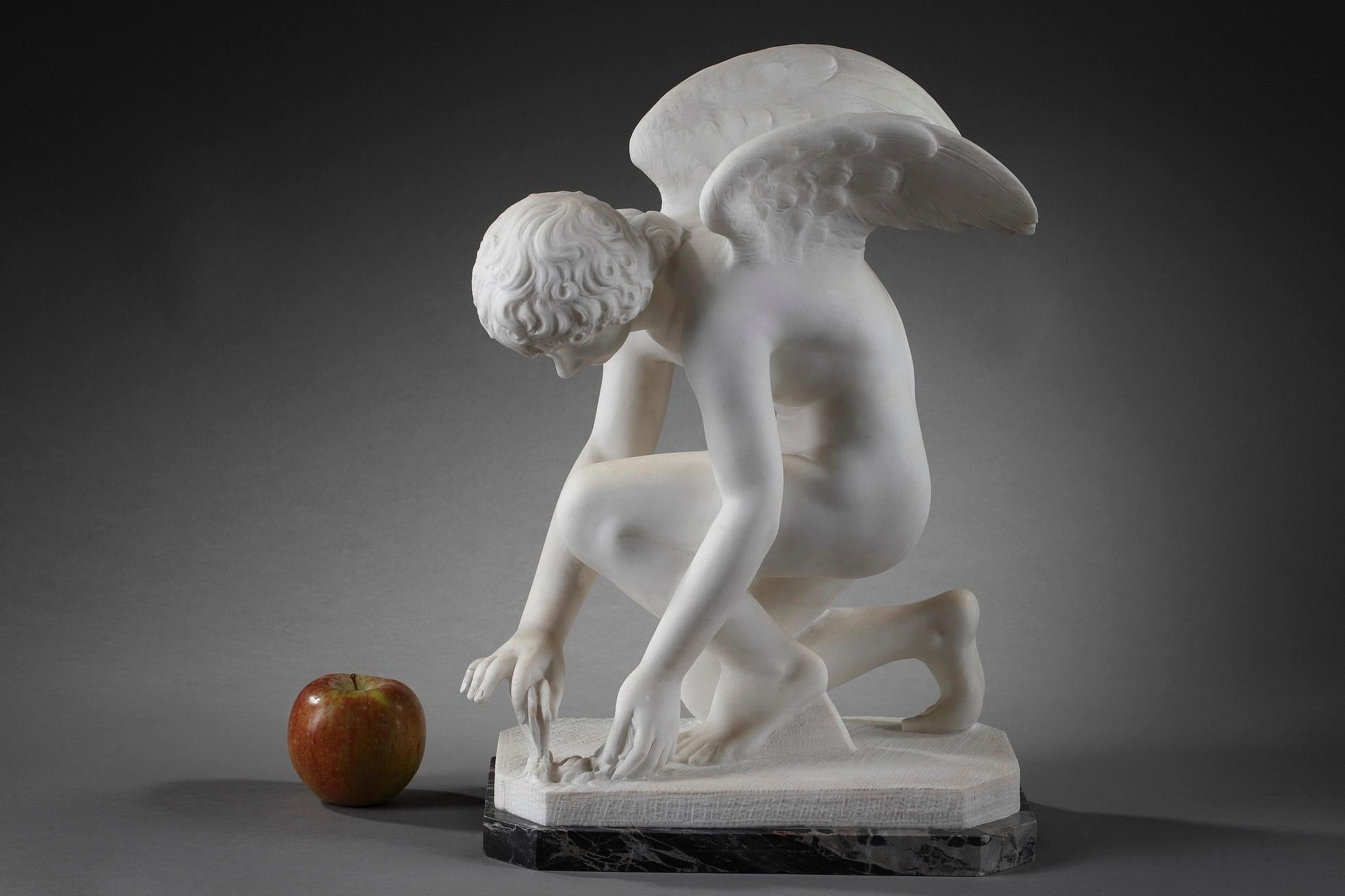 Neoclassical sculpture crafted of marble featuring Cupid, a winged adolescent, offering a rose to a butterfly he is holding by the wings.

circa 1900
Dim: W 11,4 in - D 6.7in - H 15.4in.
Dim: L 29cm, P 17cm, H 39cm.

The butterfly, a prisoner,
