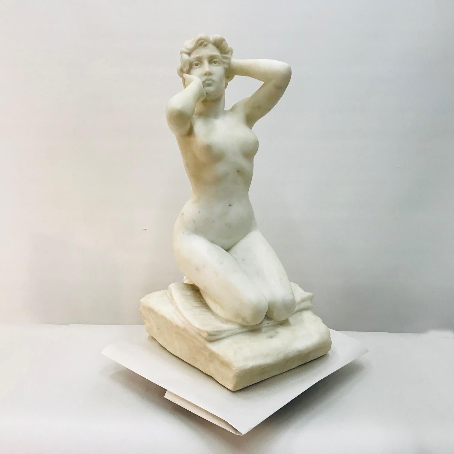  Constantino Barbella (1852-1925)
 La Bagneuse, White Carrera marble.
 depicting a nude woman kneeling on a cushion and languidly arranging her hair; 
signed C. Barbella
In its day this would have been seen as a rather daring depiction of the female