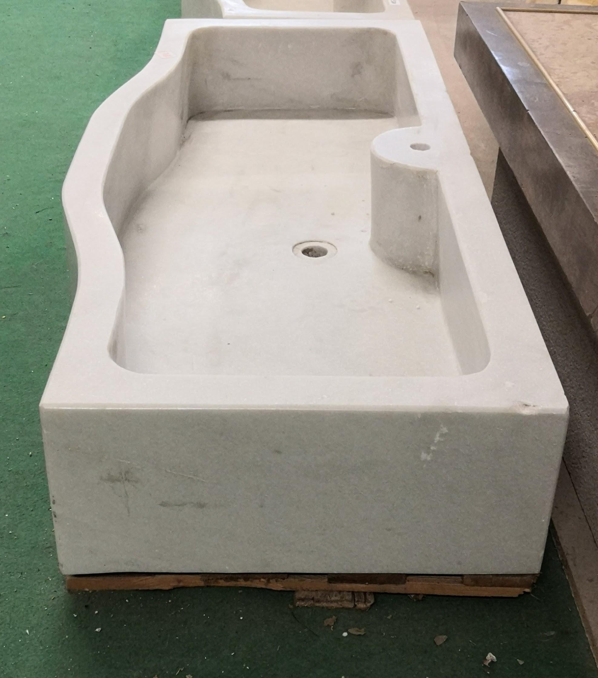 Contemporary marble sink basin of simplistic design, made from one piece of stone, condition is good with character veins.
also ideal for outdoor purposes too.
Limited Stock
Measures: 4' wide.



