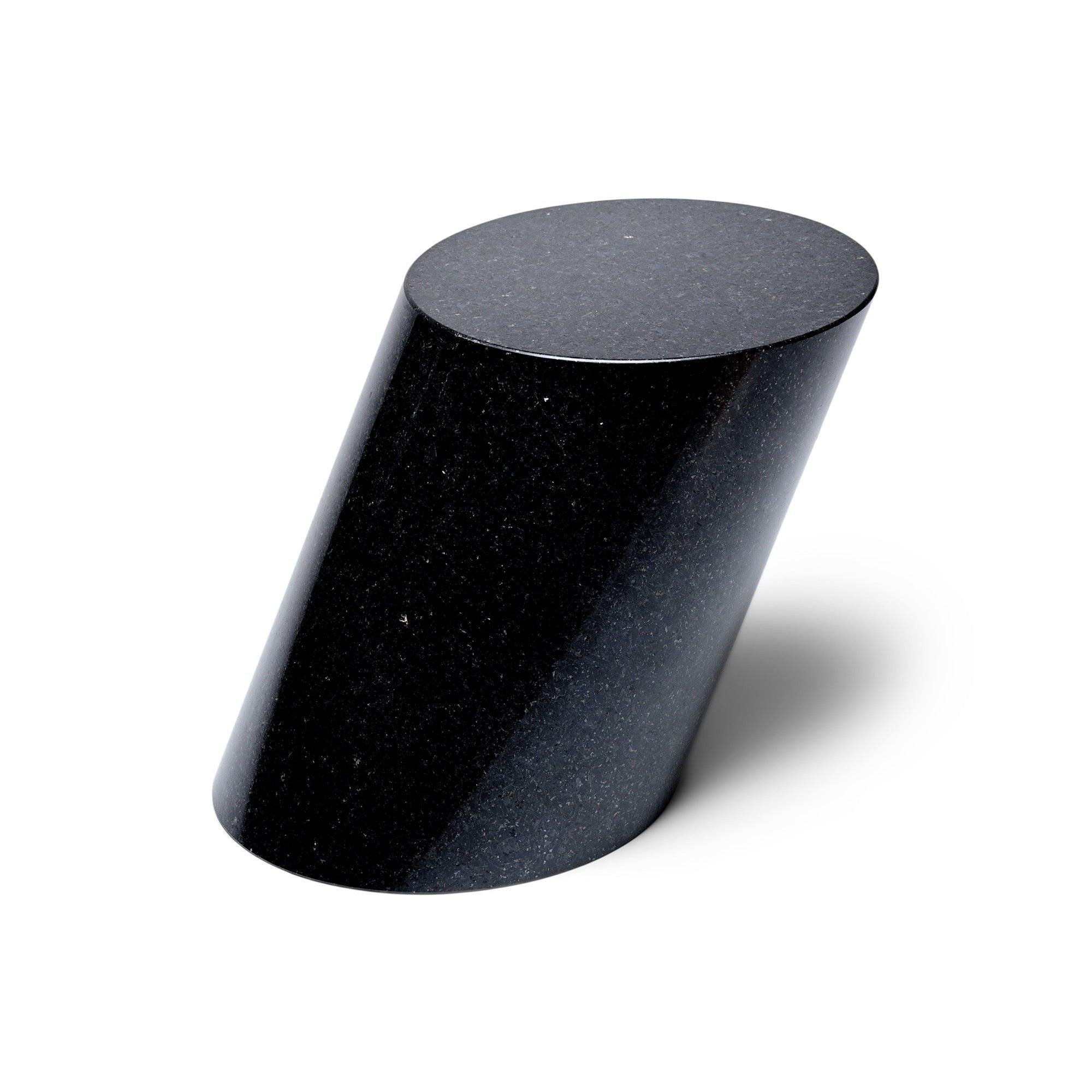 A geometrical pure, solid Nero Marquina marble table by Lucia Mercer for Knoll.