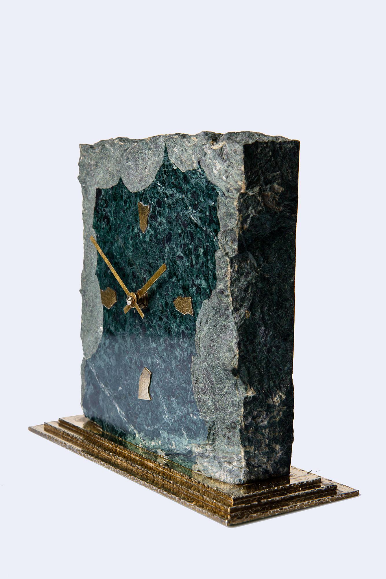Beautiful marble table watch, standing on a brass base.
Brutalist style by Kienzle, Germany, in great working condition