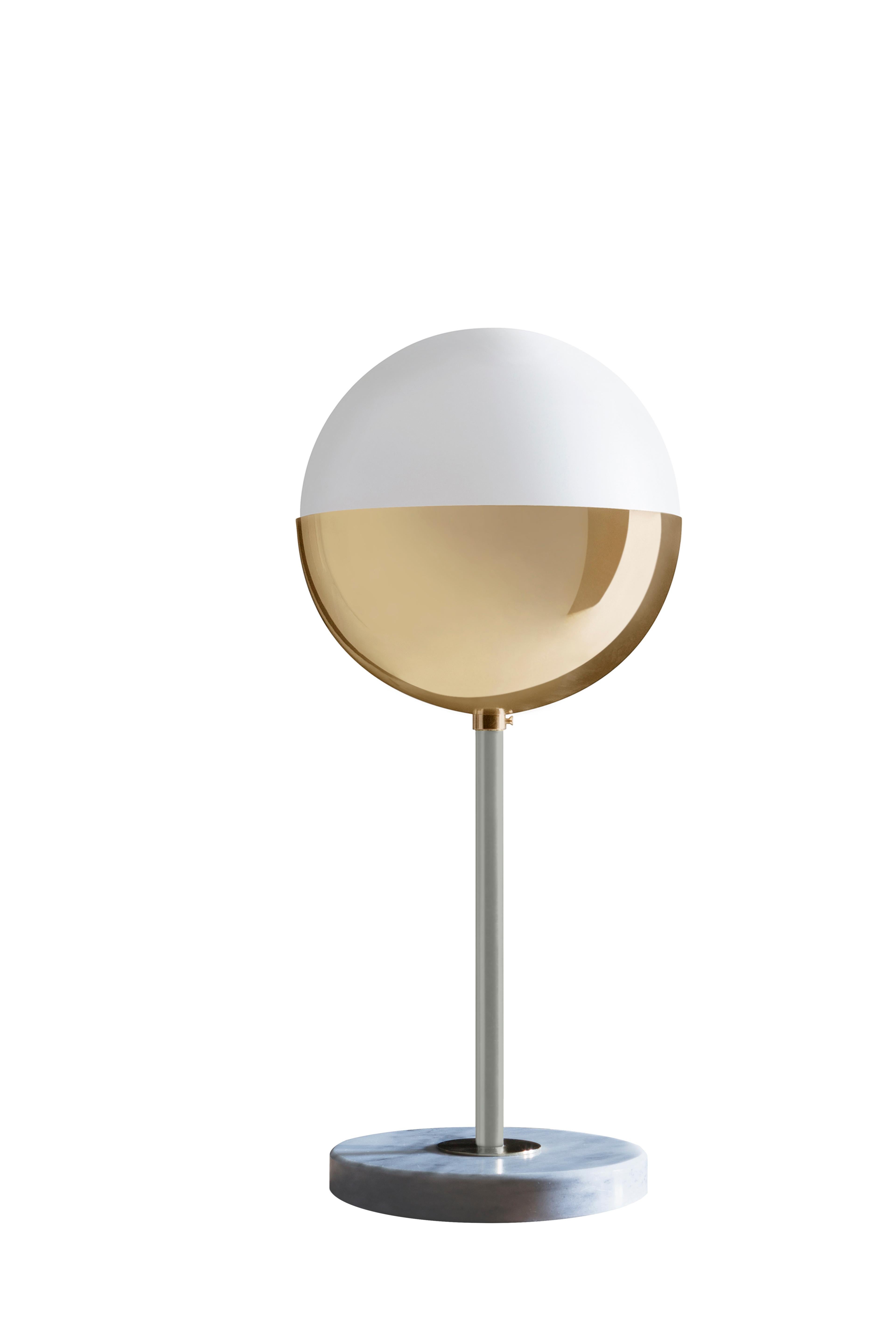 Marble table lamp 01 by Magic Circus Editions
Dimensions: H 50 x W 22 cm
 diameter spheres: 22 cm
Materials: Marble, Smooth brass, mouth blown glass
Dimmable version available. 
Available Finishes: Brass, nickel
Available colors (central