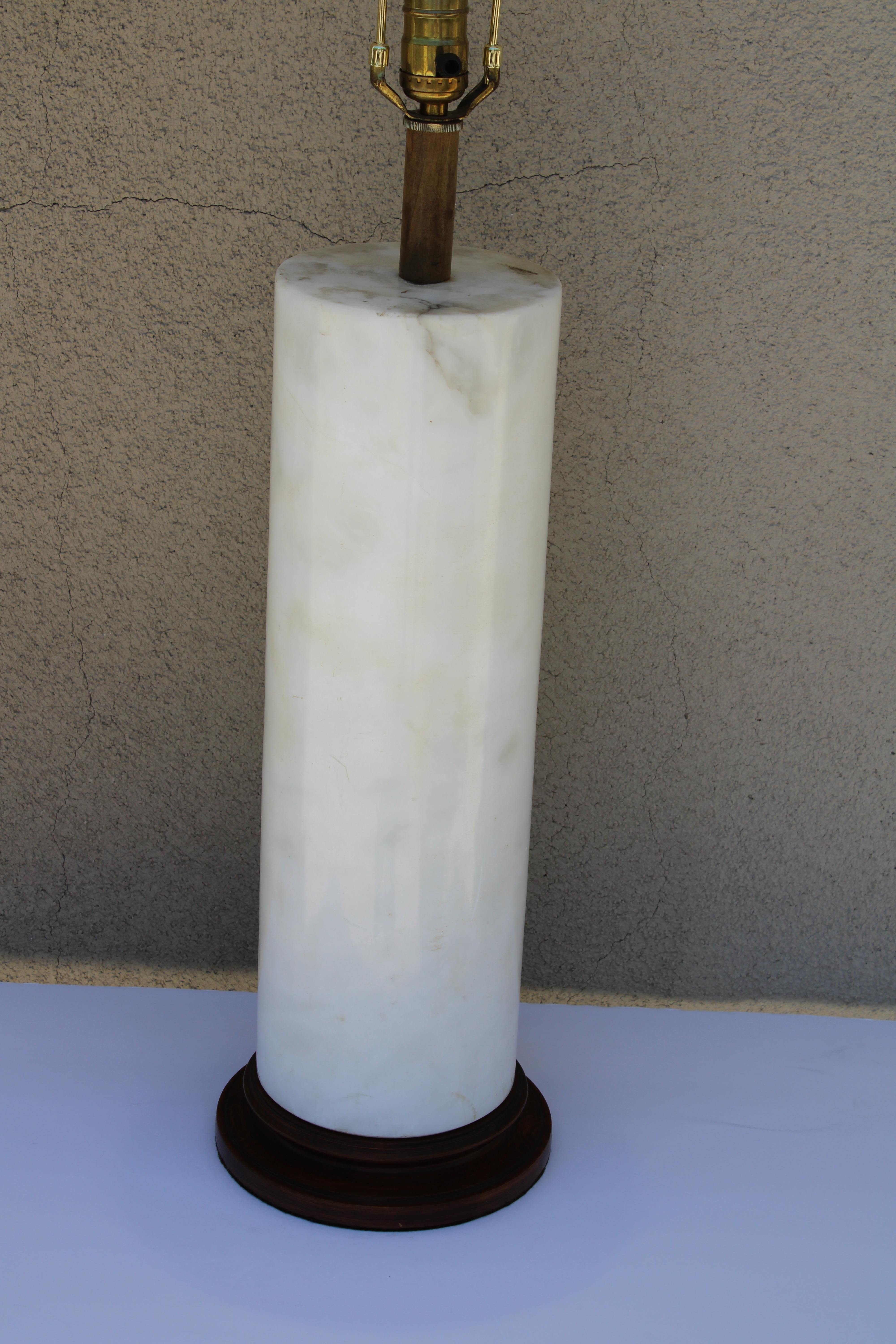 All original marble table lamp with original finial. Lamp has been professionally rewired. Lamp weighs about 40 pounds. Total height from base to the bottom of socket is 24.5