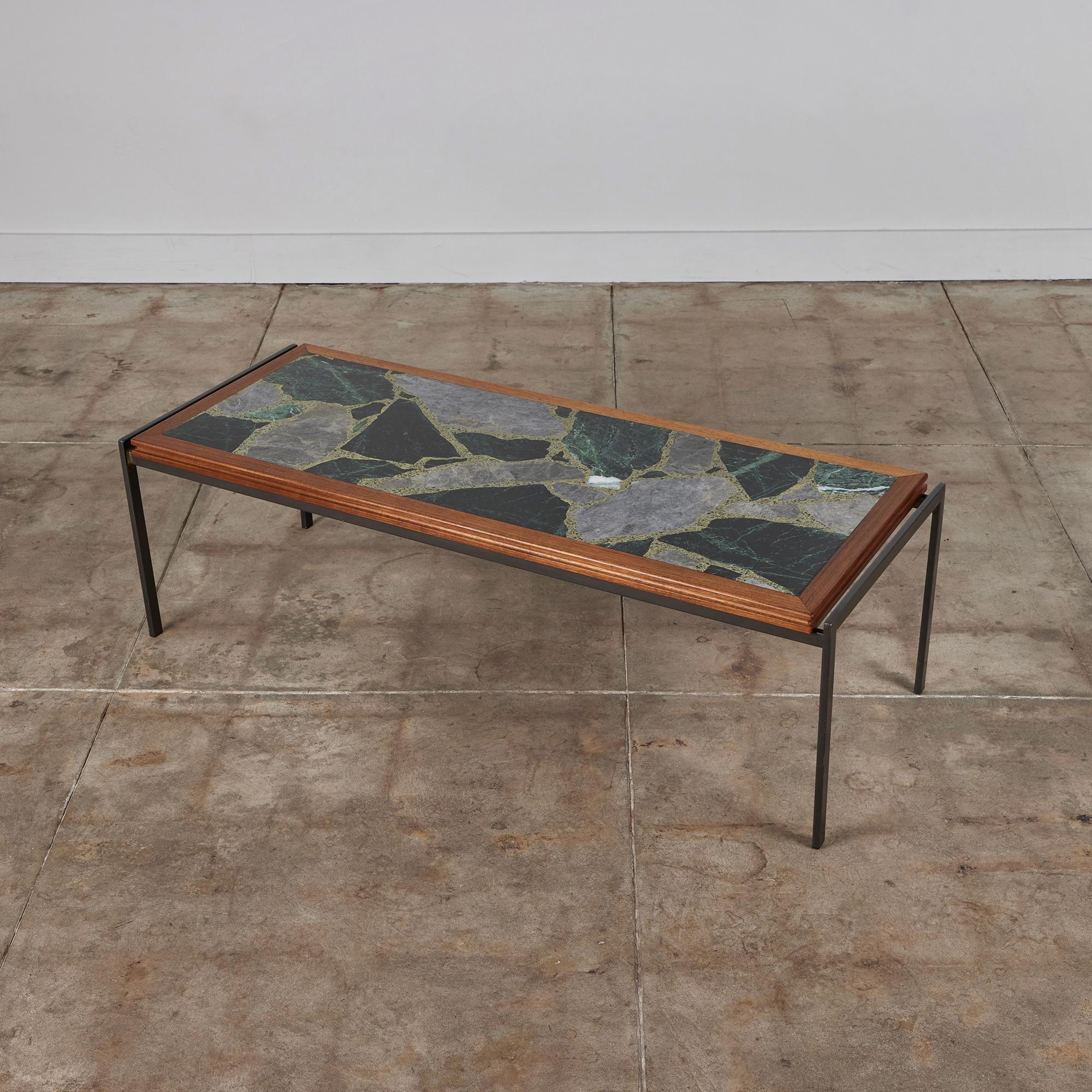 Marble top coffee table by Framac, c.1960s, Australia. The rectangular table features a blackwood frame and marble terrazzo stone top in varying green, gray and  cream tones. The table top is supported by an industrial steel base.

Dimensions
53”