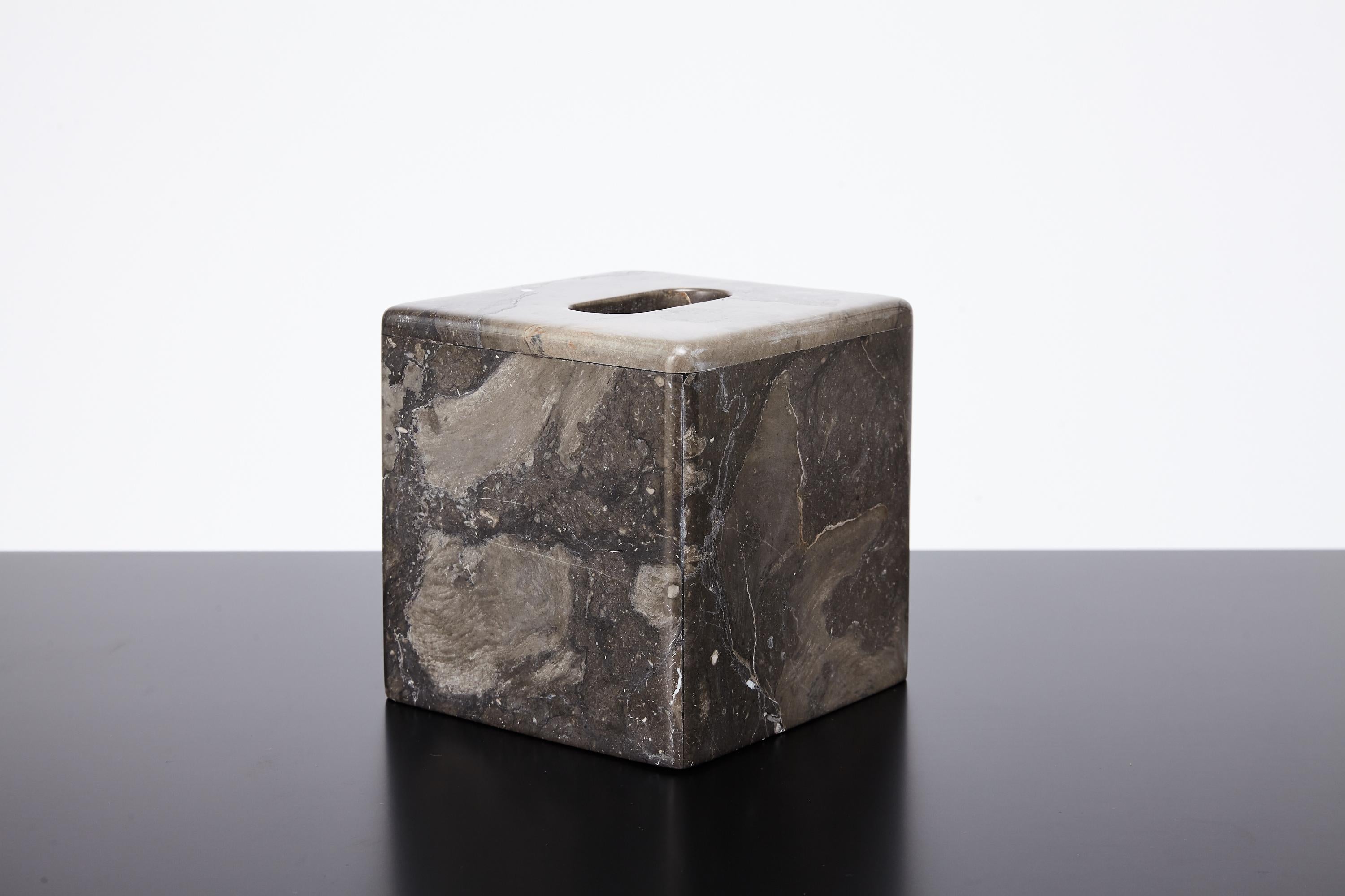 Minimally chic marble tissue box selected by Interior Designer Kelly Wearstler for her project - the Viceroy Miami, circa 2008. Kelly Wearstler is known to favor marbles with interesting veining or patters and you can gather from the photographs the