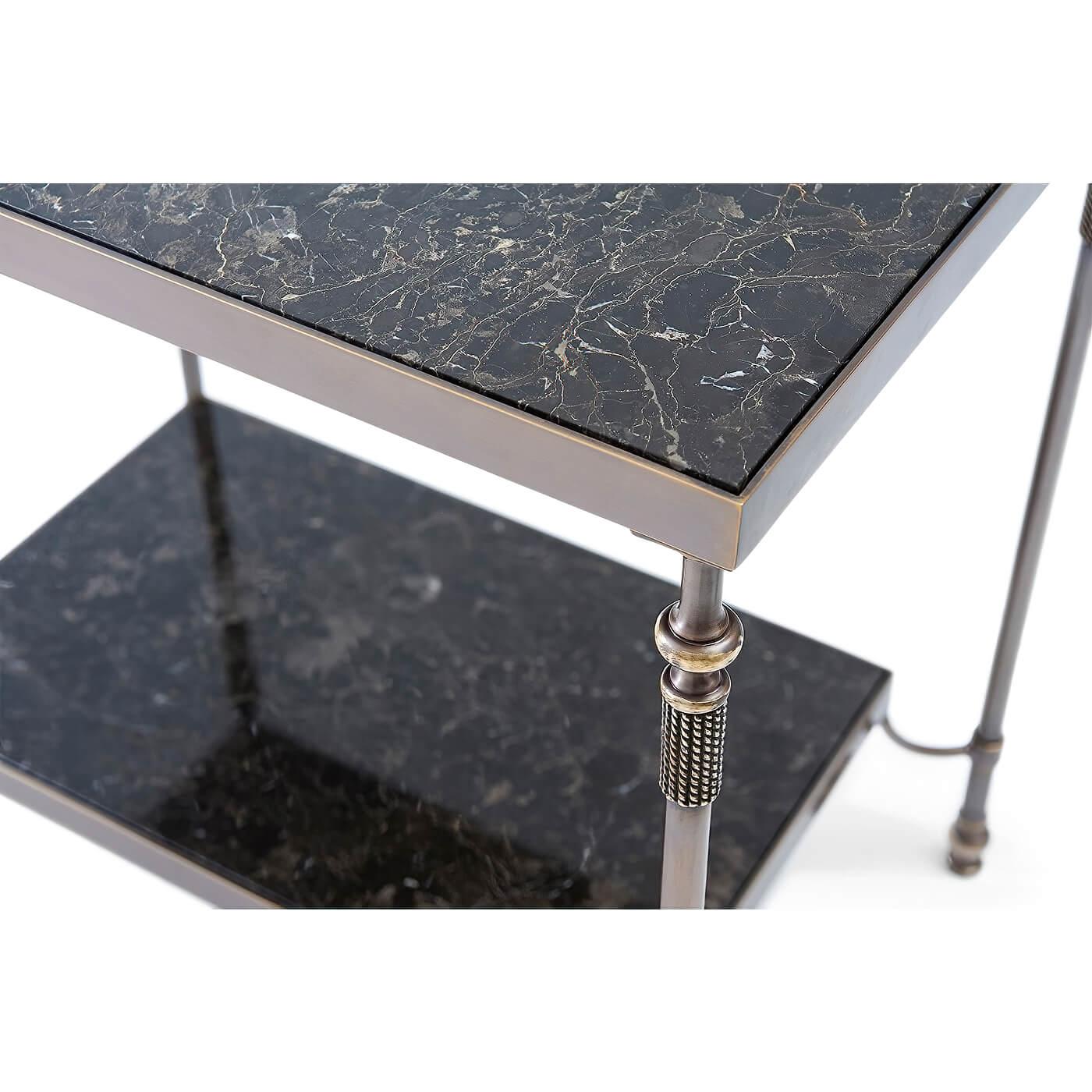 Modern brass and marble inset to tier table with an antique brass finish and Novo Portoro marble inset to the top and shelf stretcher

Dimensions: 28