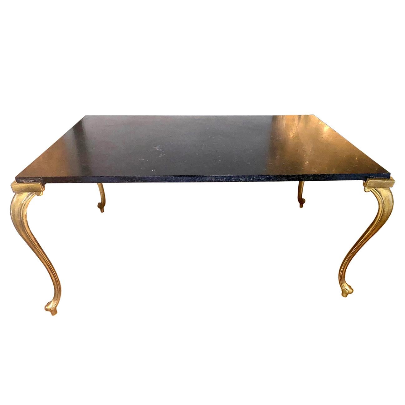 A circa 1950s French marble-top coffee table with gilt bronze legs.

Measurements:
Height 17.5