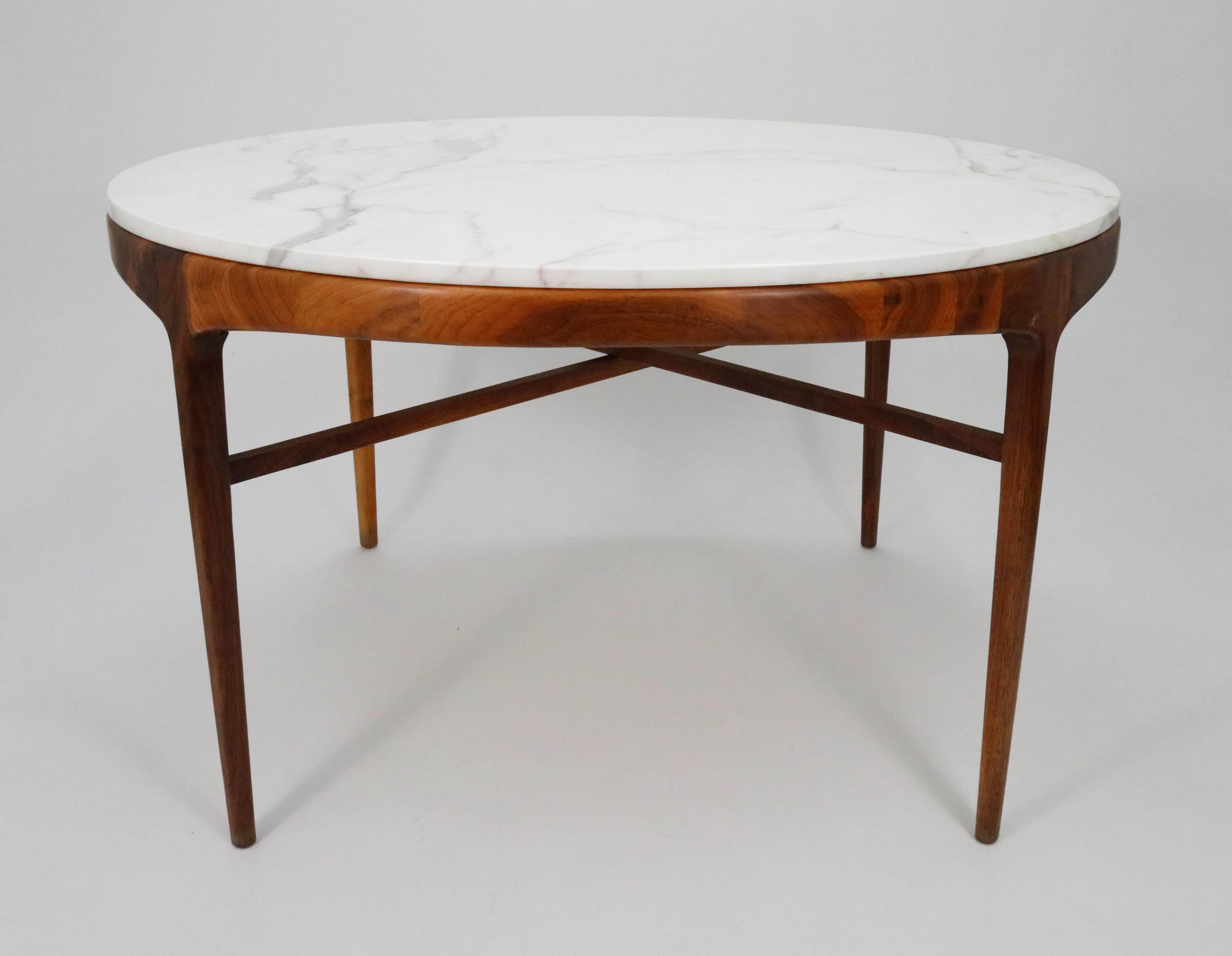 A rare Carrara marble and walnut dining table for Lane's 'Rhythm' series. 

Custom ordered for the sole previous owner by the Denver Design Center in the mid-1960s.

This beautiful edition is perfectly made for intimate dinners - or maybe even a