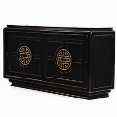 Marble top ebonized sideboard in the manner of James Mont, C. 1950.