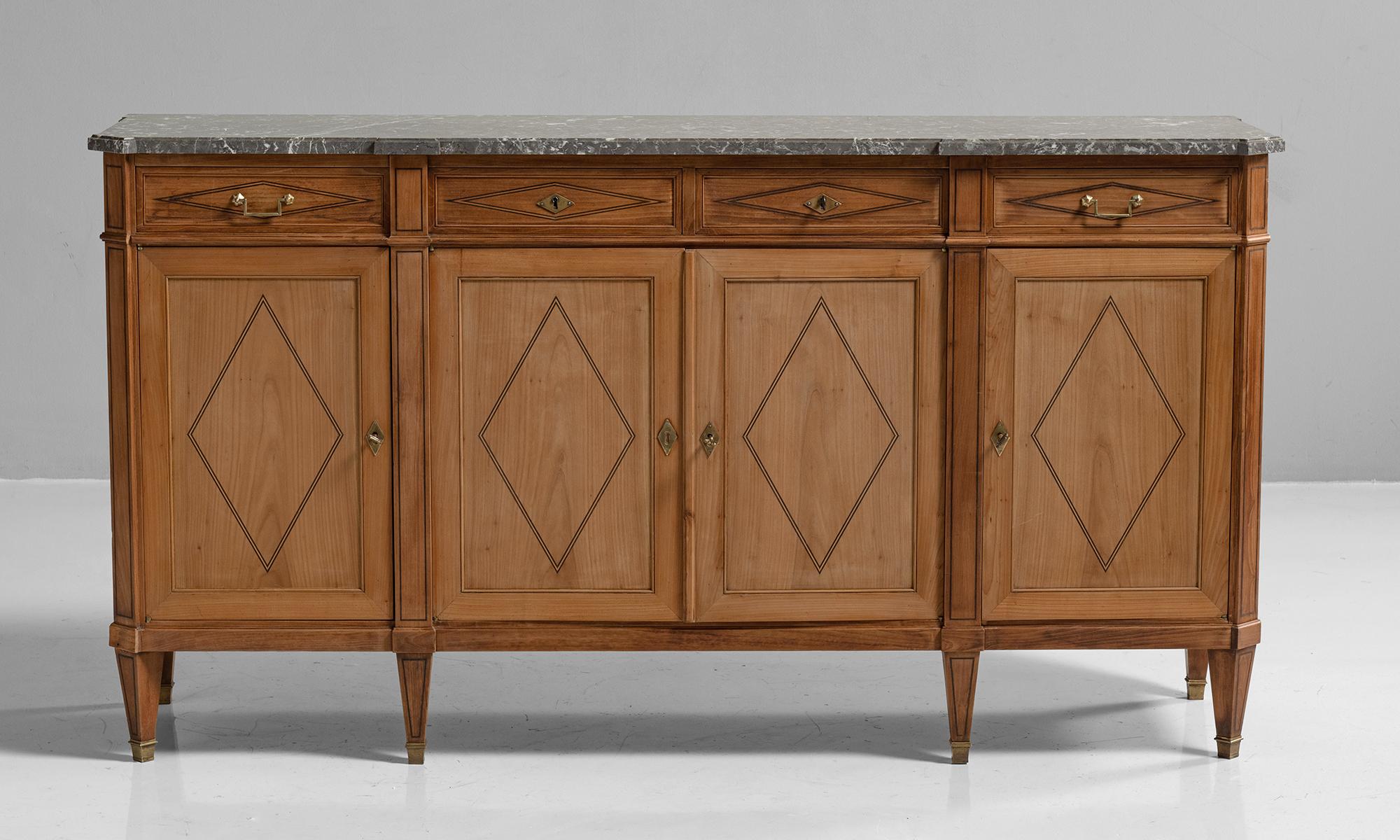 Marble top enfilade

France circa 1880

Breakfront buffet with four doors and drawers, retaining original marble top.
