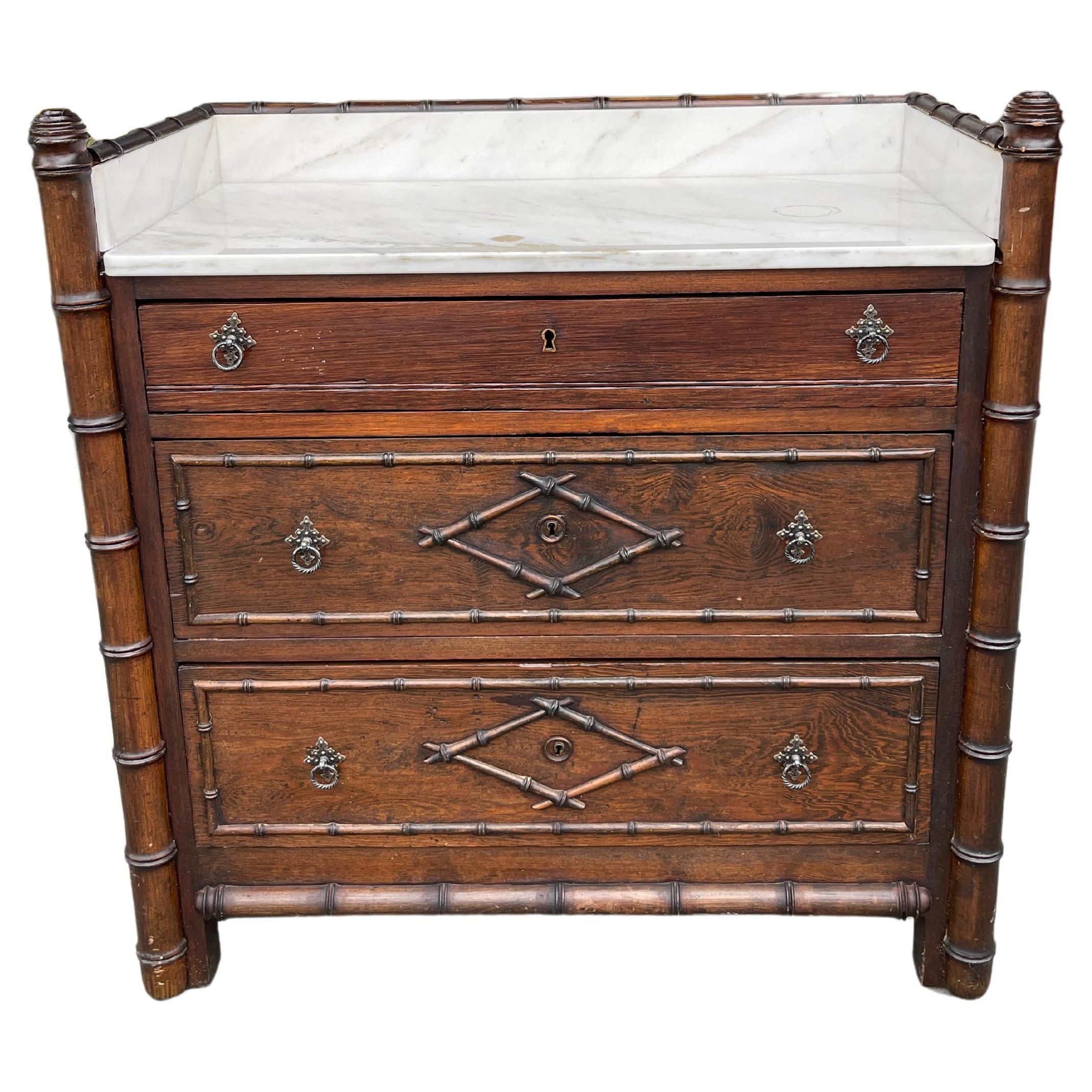 Marble top faux bamboo chest early 20th century  For Sale