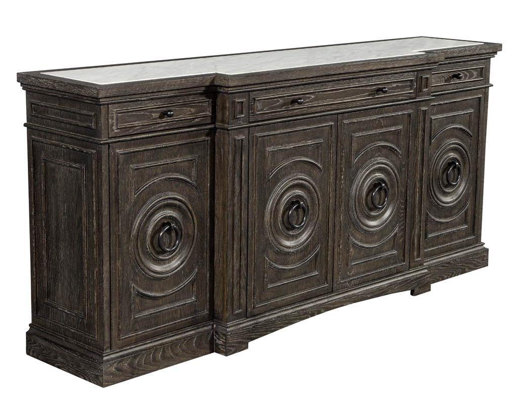 Marble-top oak sideboard buffet milling road emperor. Solid oak piece with distressed finish. Featuring clean cut marble top with lots of interior storage.
Price includes complimentary curb side delivery in the continental USA.