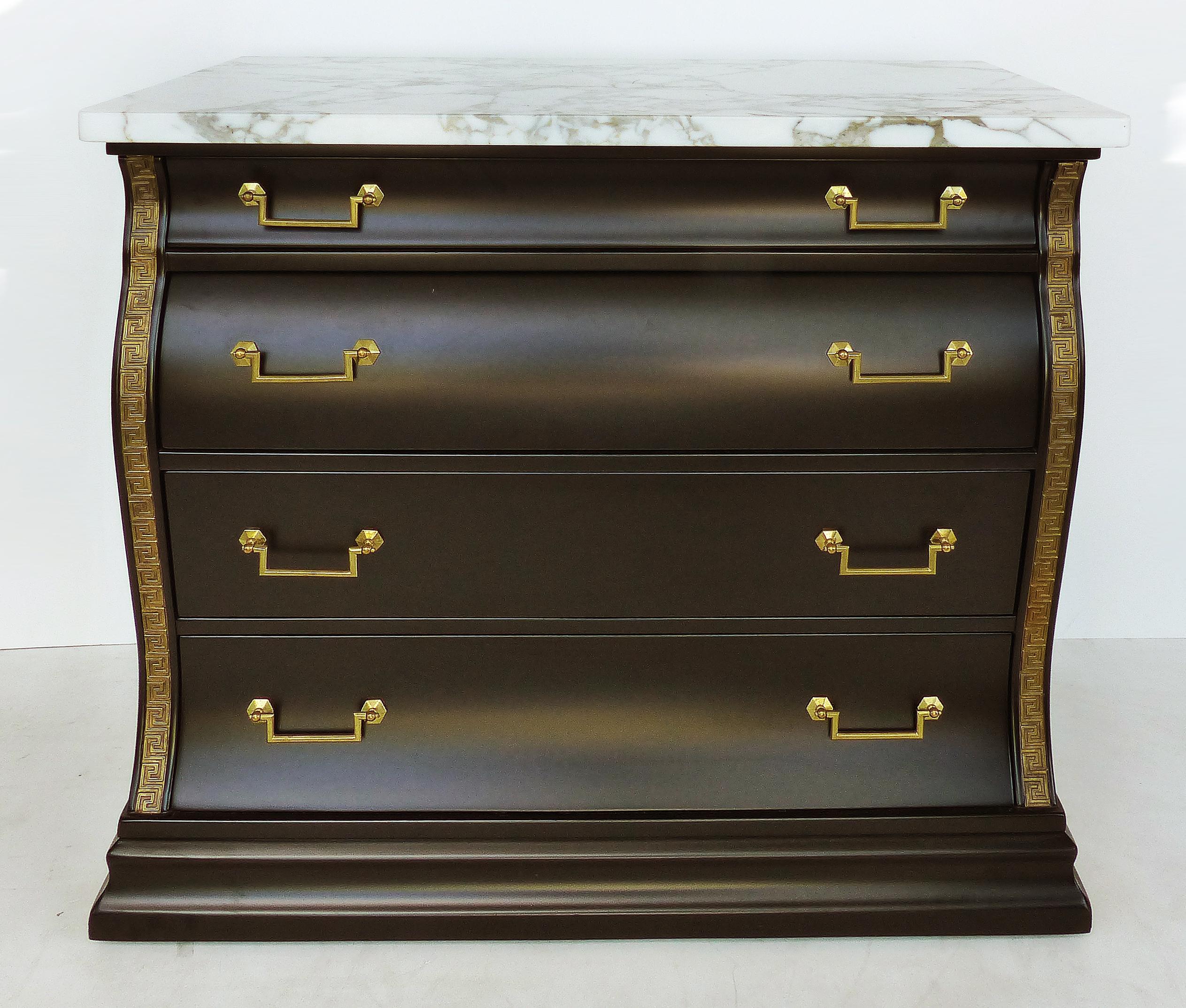 Marble Top Serpentine Front Chest of Drawers, Greek Key Brass Hardware 

Offered for sale is an elegant late 20th-century serpentine front chest of drawers with a marble top. The chest has 4 graduated drawers with brass handles and is detailed