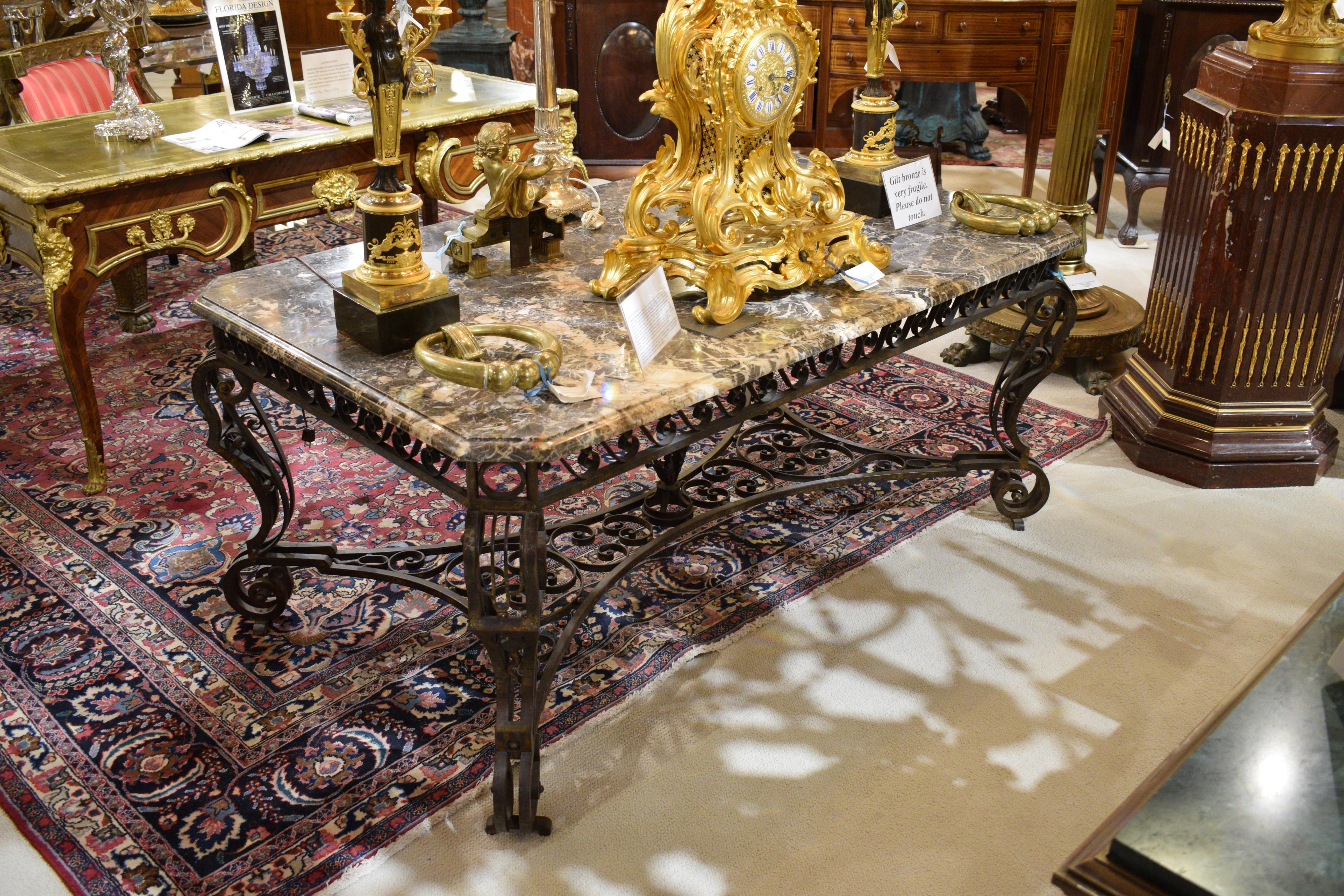 A very fine iron and marble-top table, circa 1930.
Dimensions:
D 41