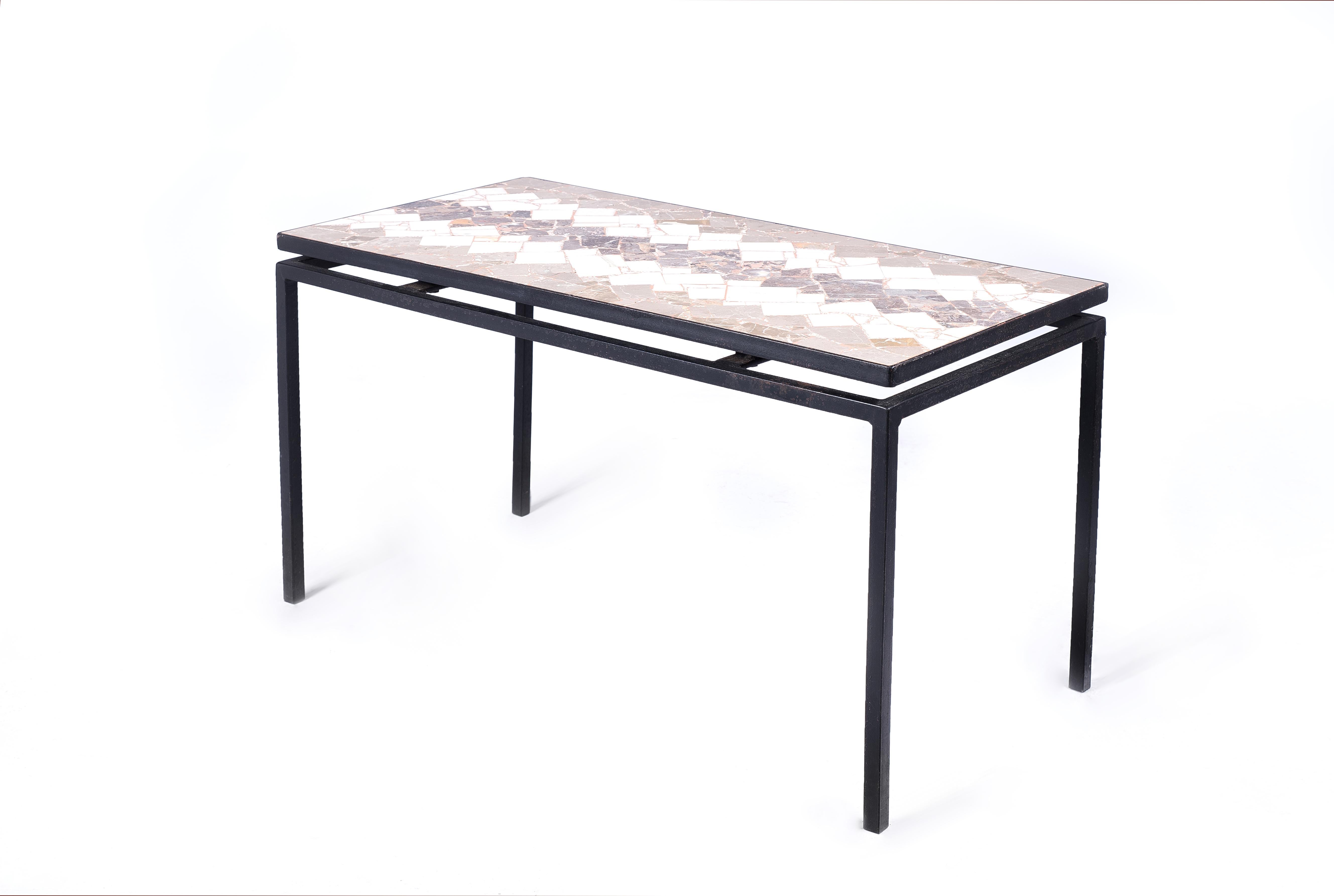 Minimalist vintage coffee table from Hungary. The simple design and geometric shapes. This beautiful coffee table stands on an iron frame with cylindrical legs and covered with a marble top. This piece would be fit to your living room or your
