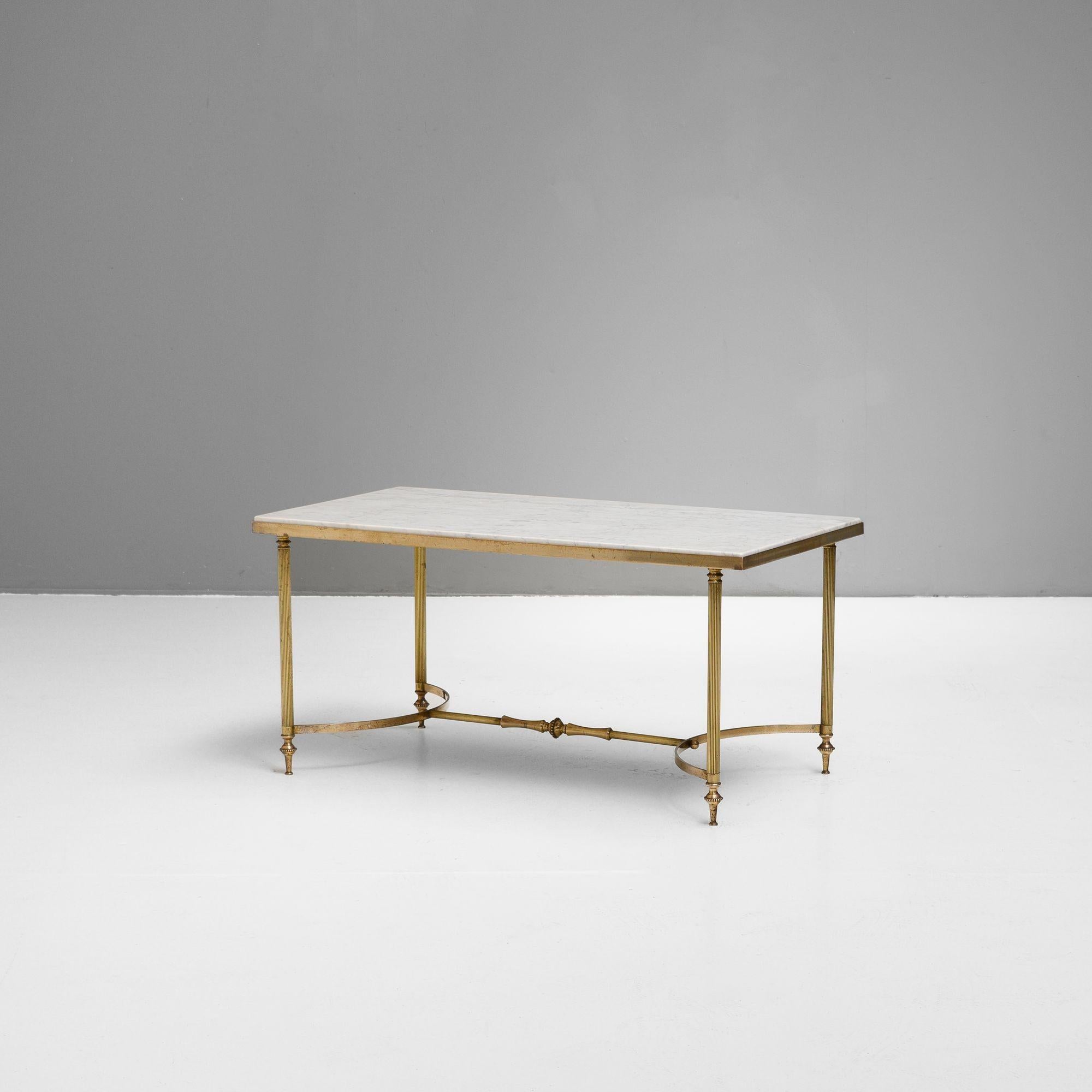 Brass framed marble top coffee table.
France circa 1930.
H 43cm x W 87.5cm x D 46cm

Please be in touch for an accurate delivery quote.