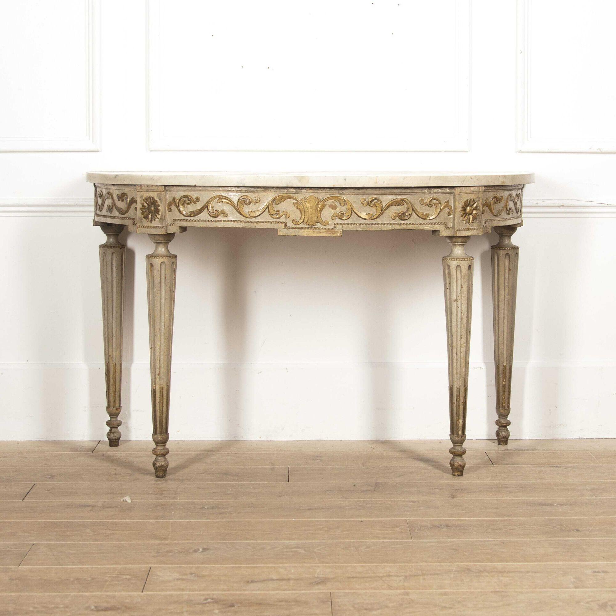French 18th century Demi-lune console table. 
This console table offers a simplistic turn throughout the frame which is supported on beautifully tapered legs with a thick marble top. 
This piece could happily free-stand or rest against the wall as