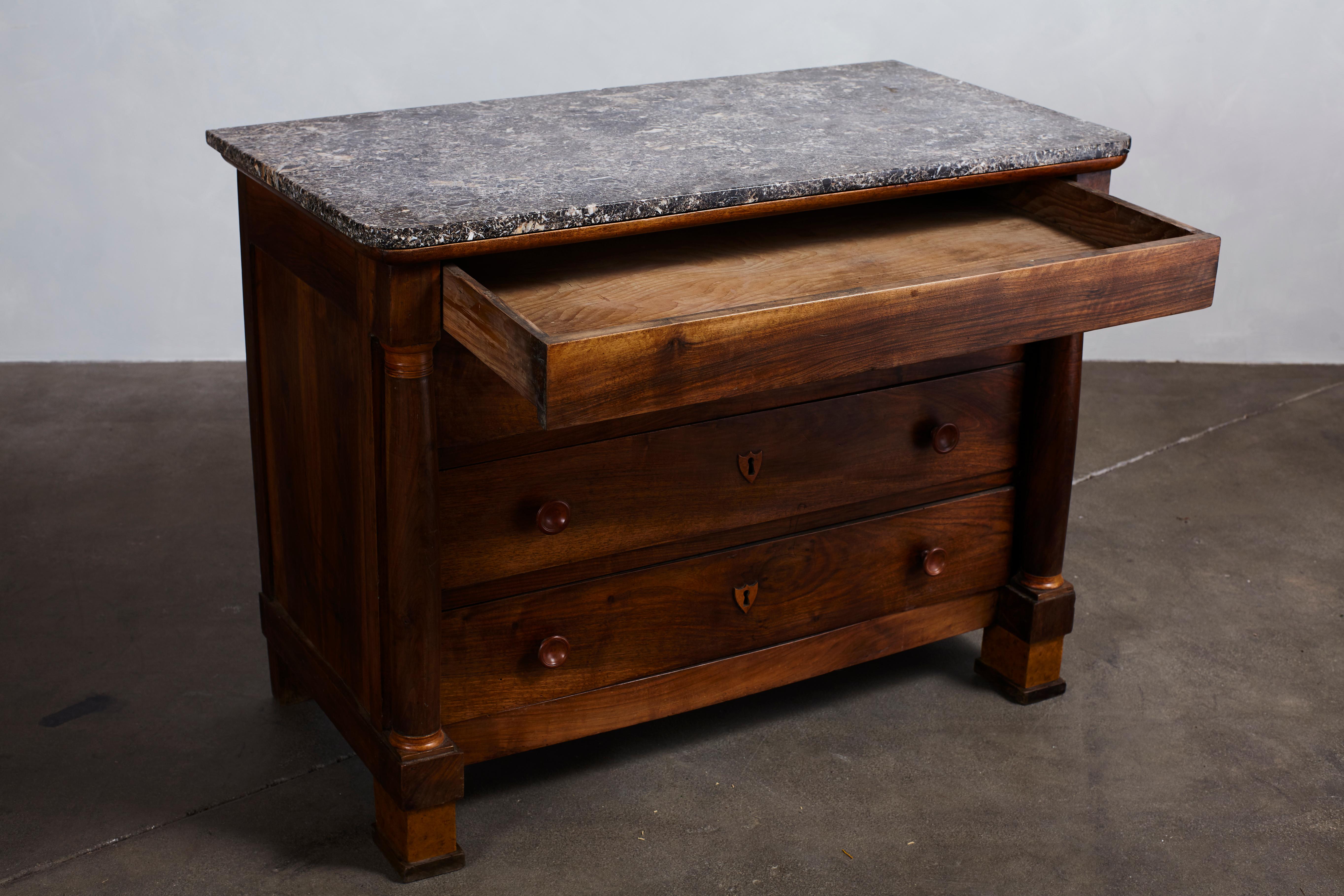 Marble Topped Four-Drawer Dresser with wood Detailed Key Holes 3