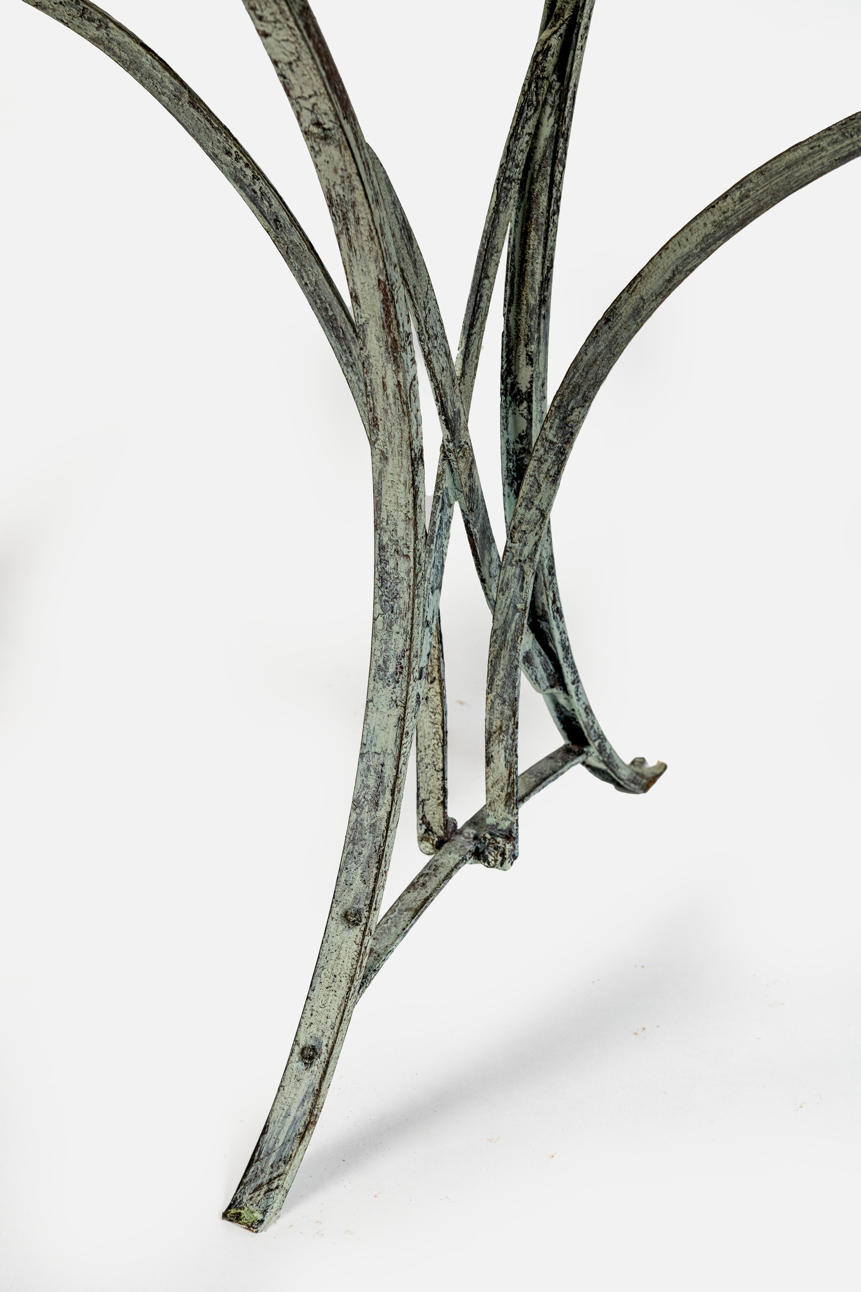 19th Century Marble topped table, Verdis wrought iron base, can be used inside outside.
