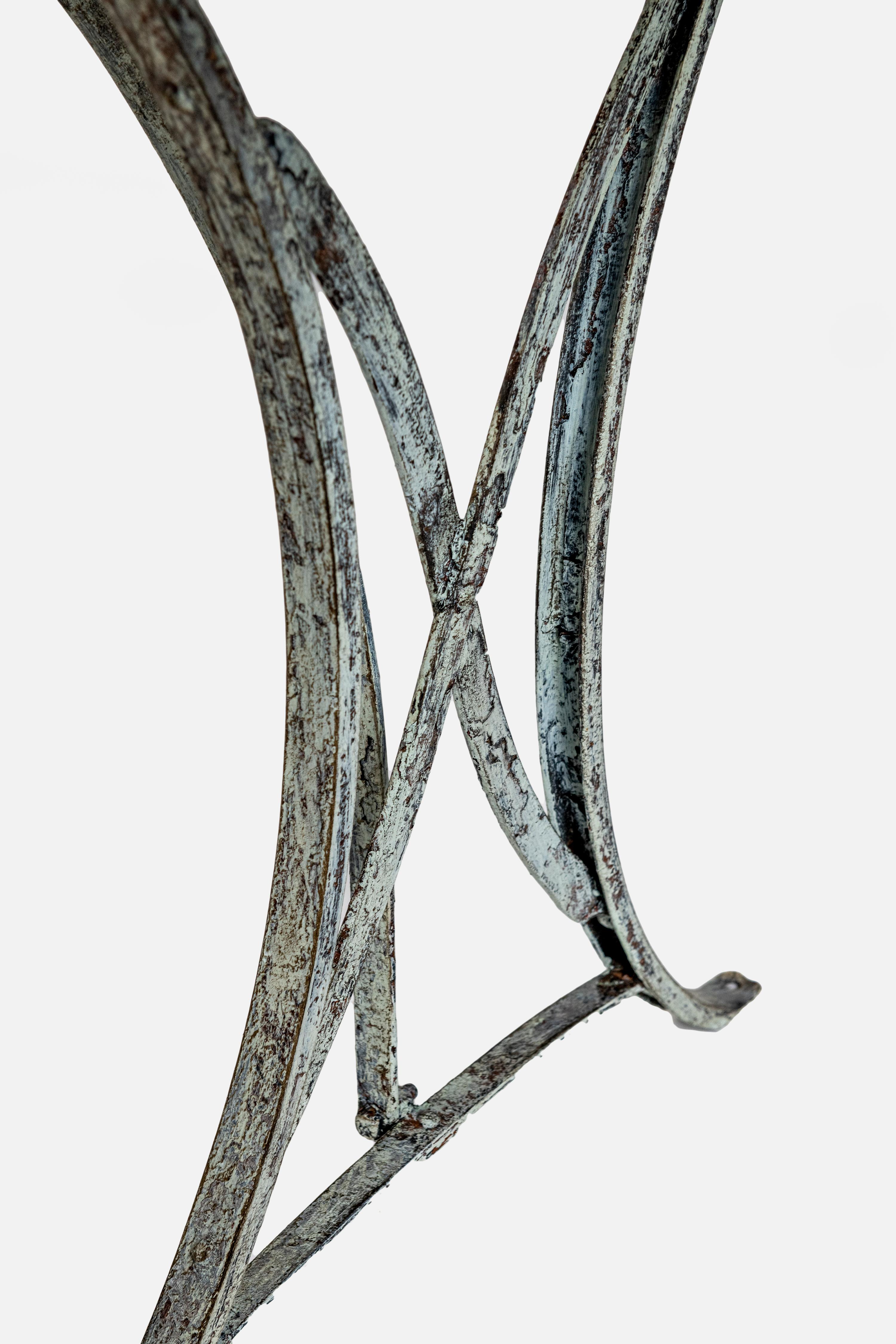 Wrought Iron Marble topped table, Verdis wrought iron base, can be used inside outside.