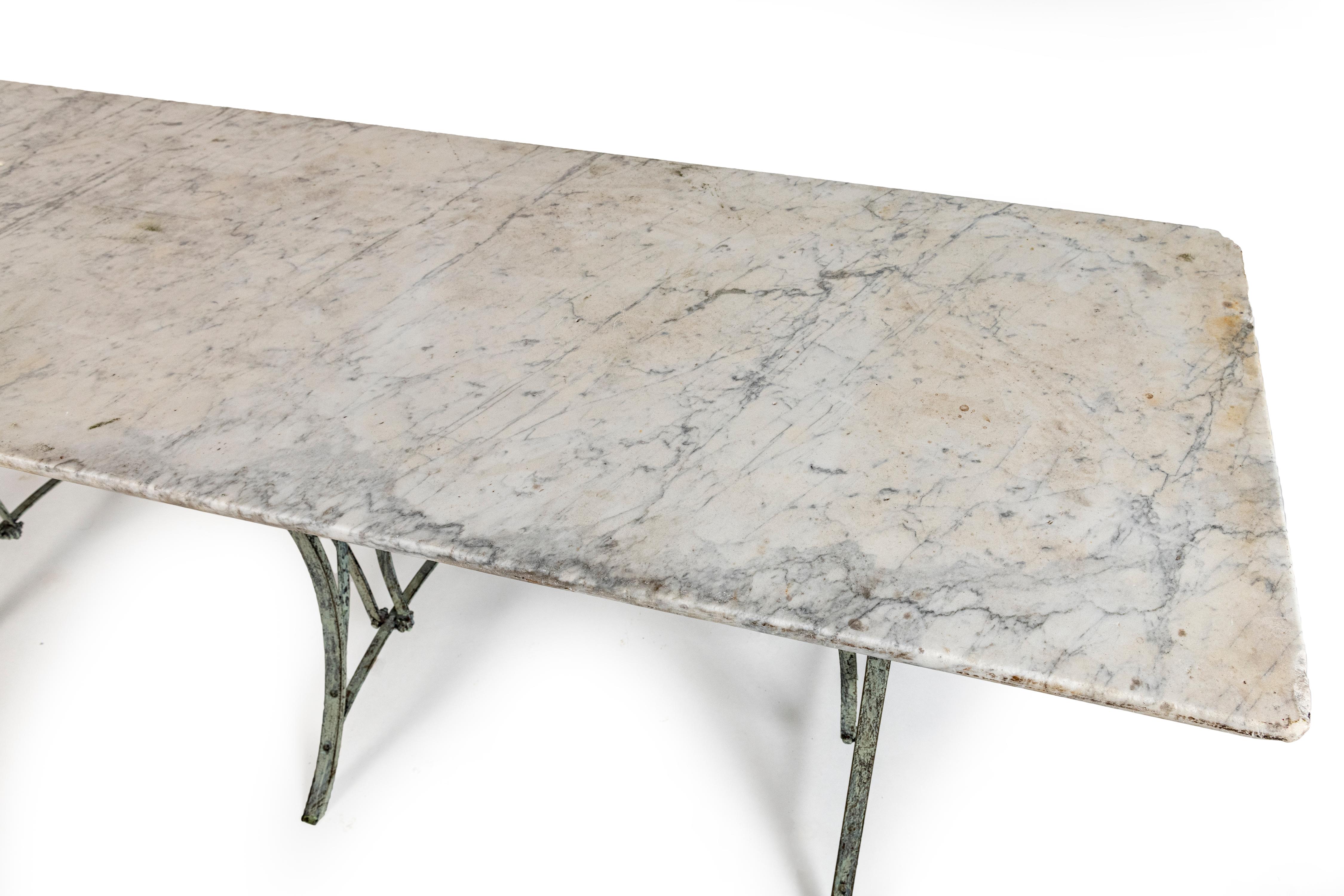 Marble topped table, Verdis wrought iron base, can be used inside outside. 2