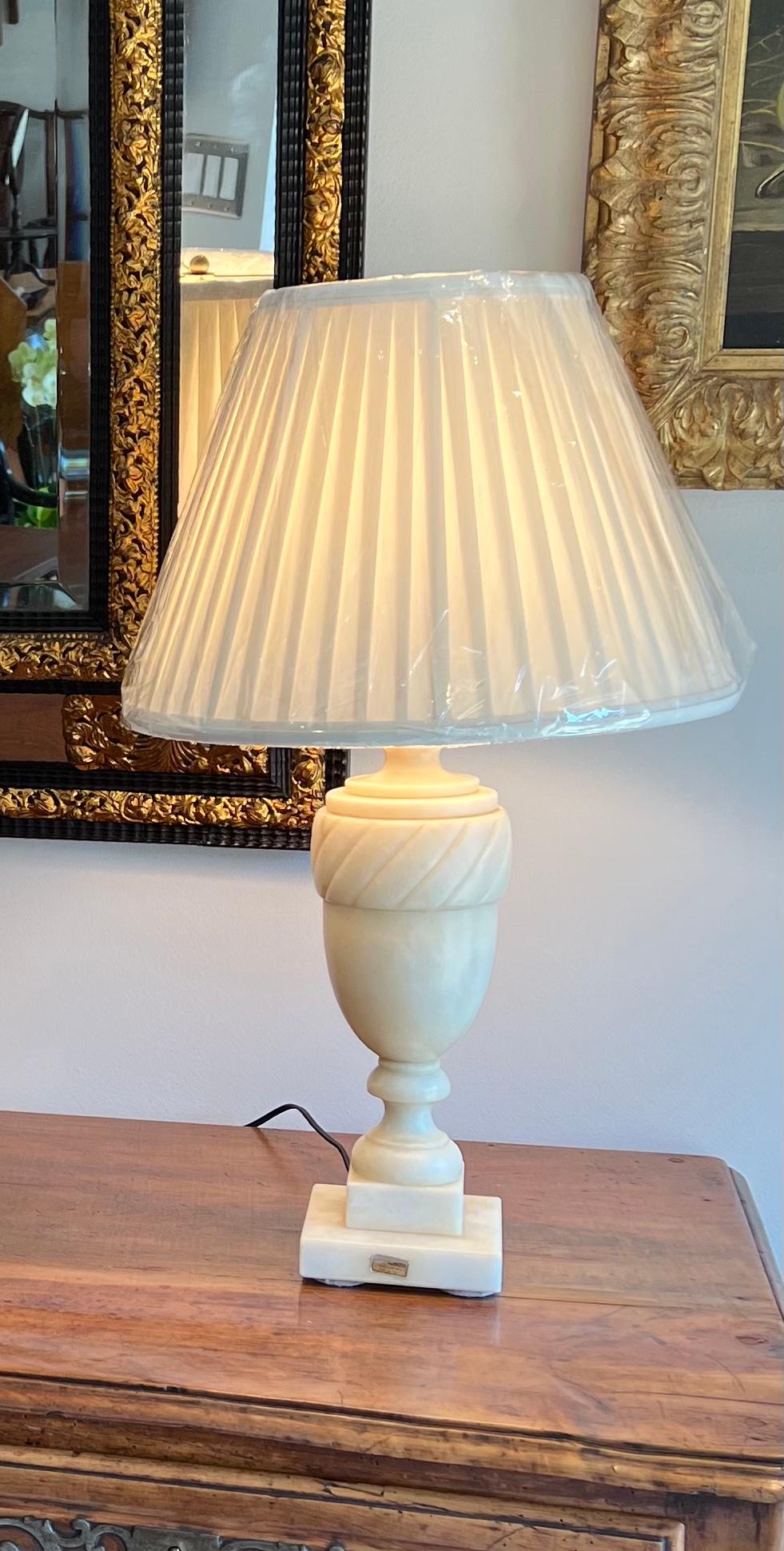 White marble urn form lamp.
 New half inch pleated shade. Wiring tested.