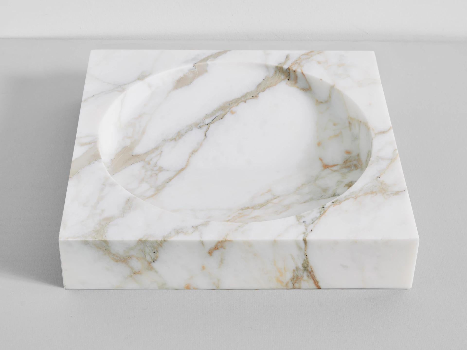 Marble vide Poche by Henry Wilson
This sculptural item is handmade in Sydney Australia.

Each piece is manufactured in natural stone, meaning variations of the pattern in the stone will occur from piece to piece. Has a honed finish.

The block