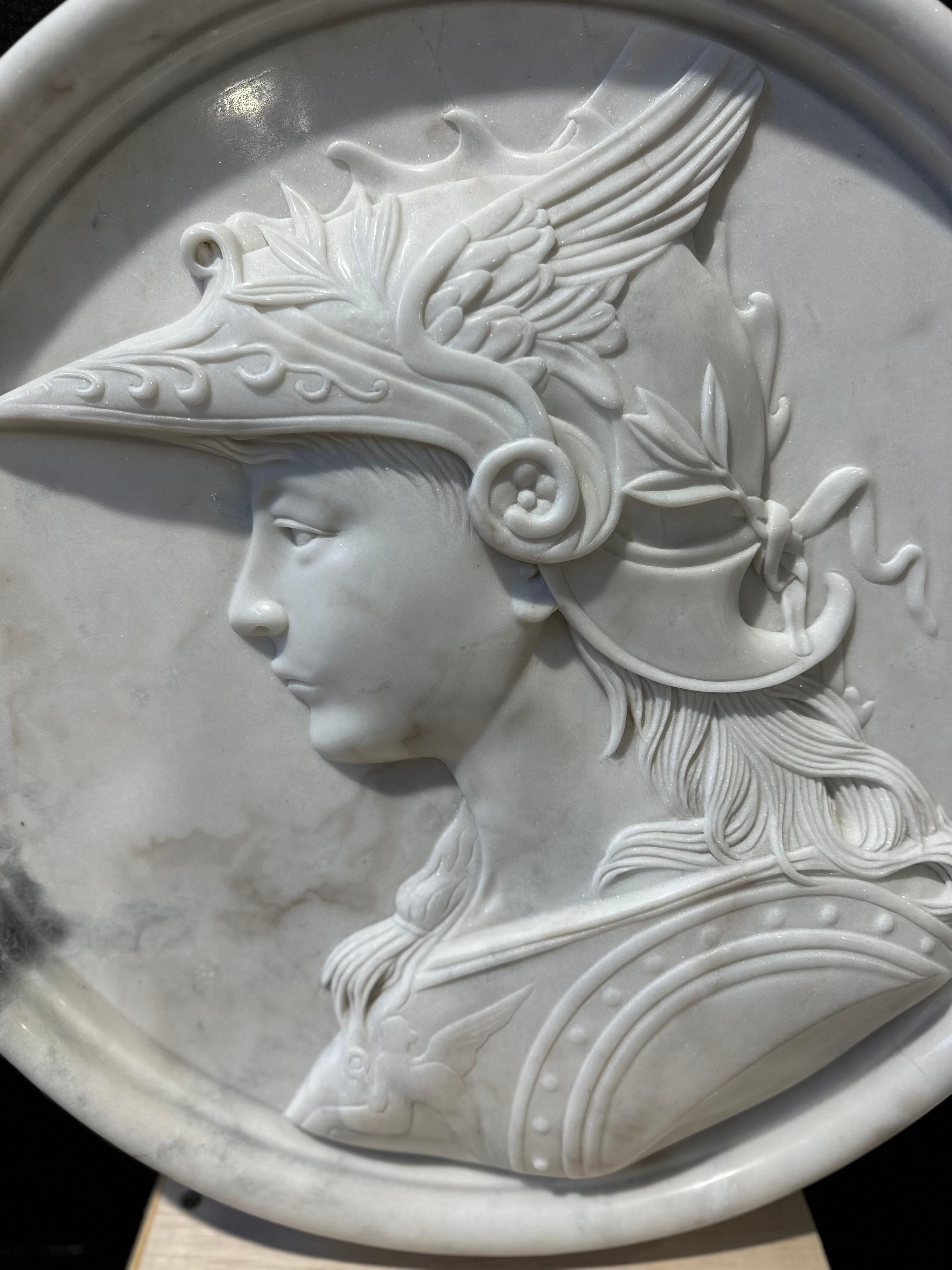 A skilfully and extremely decorative marble plaque wall carving of the Greek God Hermes (the Romans knew him as Mercury). God of trade, wealth, luck, fertility. The son of Zeus and Maia he was also the messenger of the Gods and the mediator between