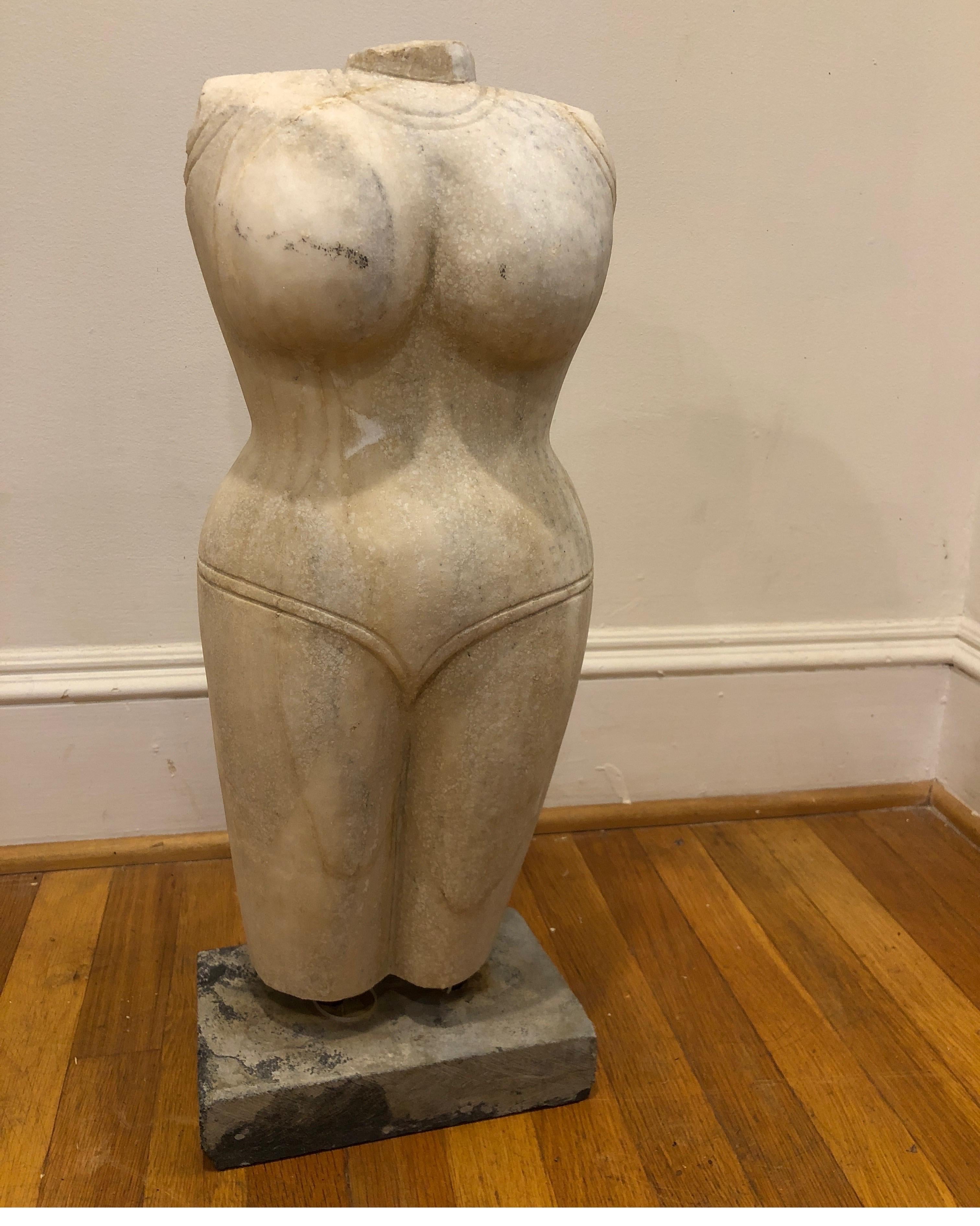 Indian style marble torso scultpture
Stately Carrera marble statuary figure of female body form. Mounted on a stone base.
Nicely carved and its overall surface has a natural patina.