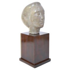 Marble woman's face sculpture, 1940s.
