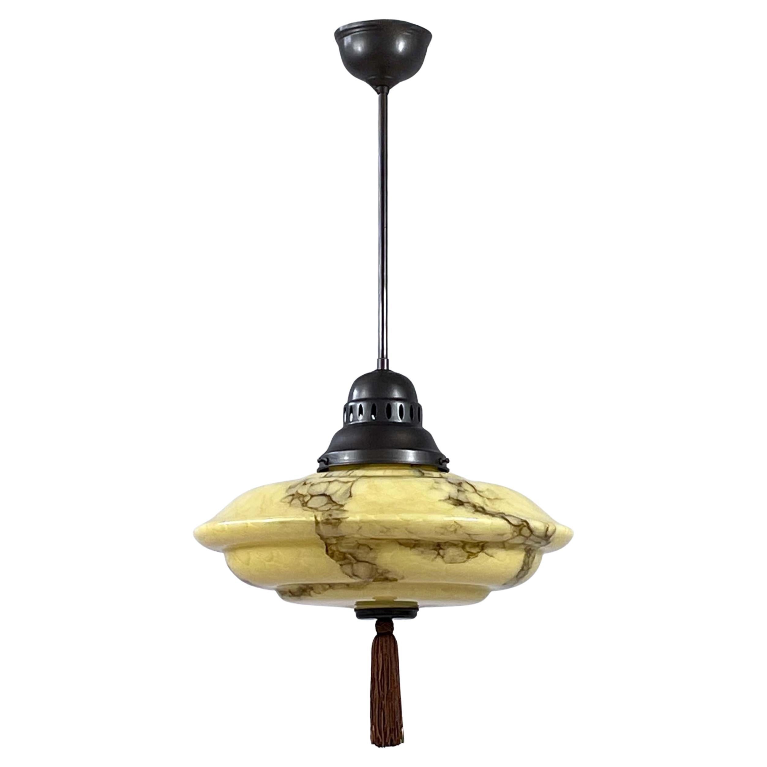 Marbled Opaline Glass
Burnished Brass Pendant with Tassel, Germany 1930s