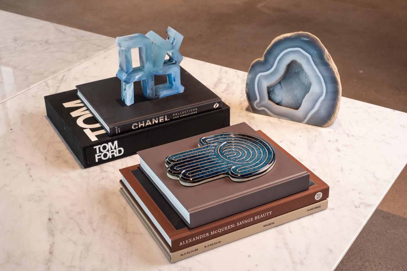 bruci's hand poured resin sculpture with an Ahava ( אהבה -love in the Hebrew language) motif is a beautiful and timeless decoration piece for any home. Given the nature of the piece being hand poured, each sculpture produced is unique and one of a