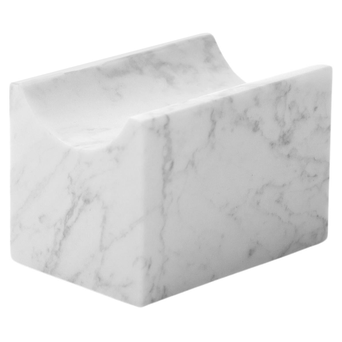 Our Marblelous Wine Holder is a robust, minimalist and timeless piece. An elegant way to present that special wine. In addition to it, the piece of Carrara marble can transfer coldness to the bottle, helping this way to maintain the perfect