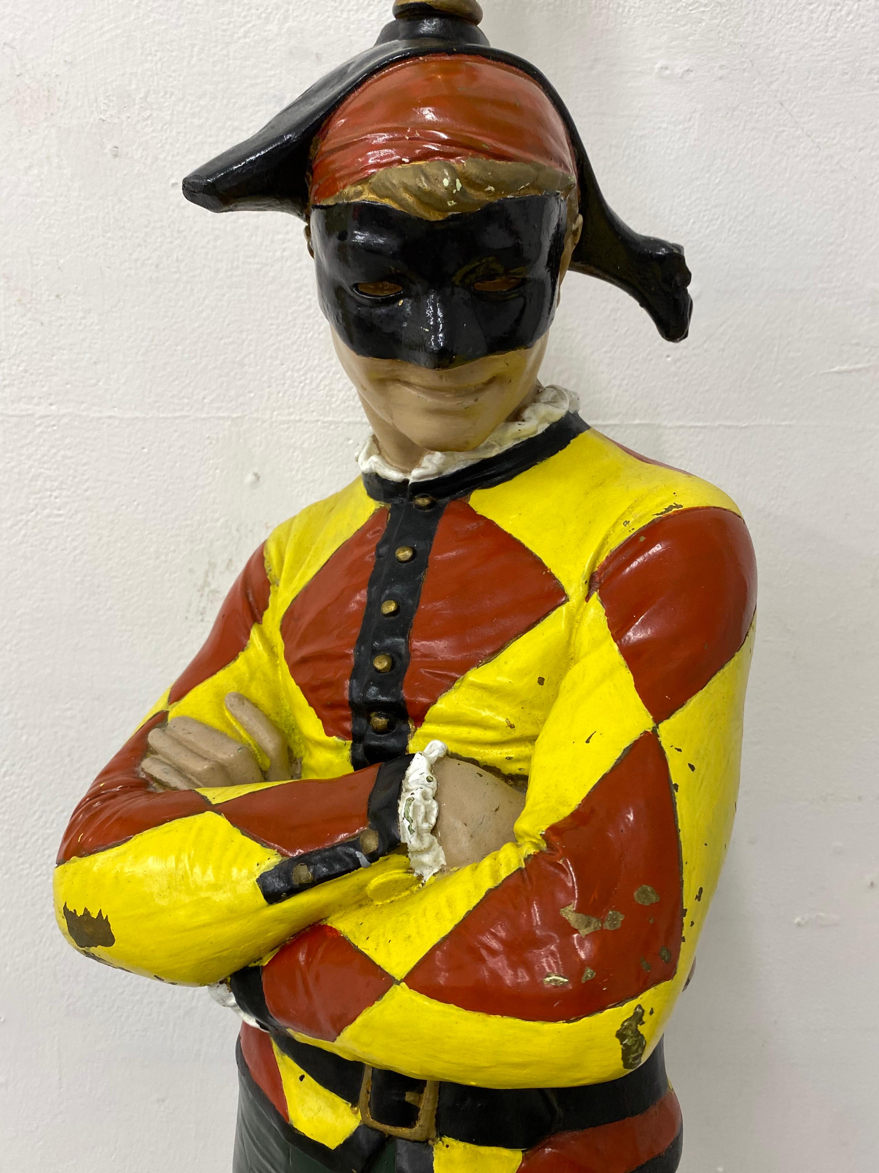 Marbro Harlequin Jester table lamp. Extra large figure painted with a red and yellow shirt and dark green pants. Looks like originally all gold and silver. Somewhere in it's life someone did a nice repaint in its current colors! A couple chips to