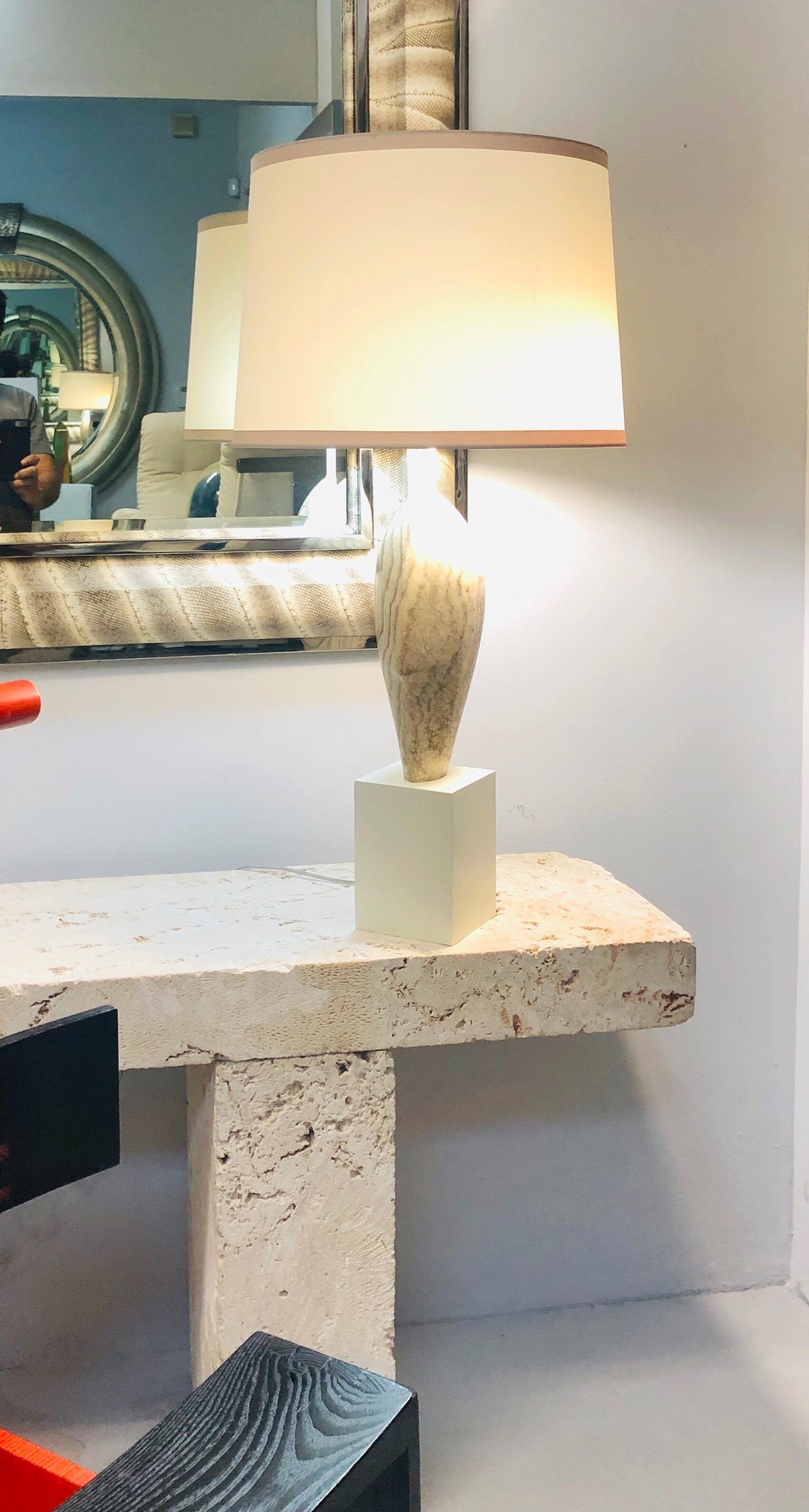 A substantial lamp by Marbro. Wood base supports a solid marble element. 2 bulb cluster. Newly wired. Shade is not included.
