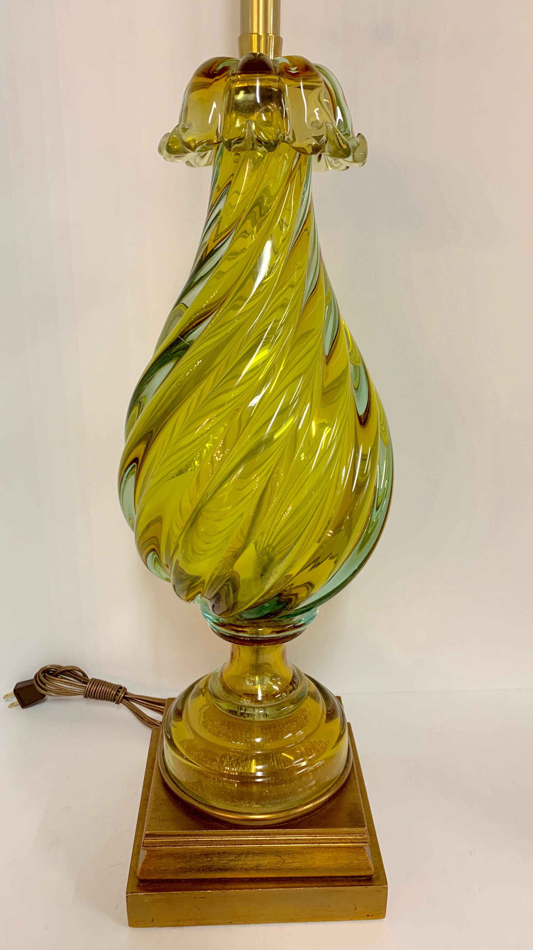 Italian Seguso glass lamp by The Marbro Company. This high quality lamp firm specialized in finding unique and special pieces of porcelain and glass and made lamps out of these pieces. The glass is in a few sections and is approximate 20 inches tall