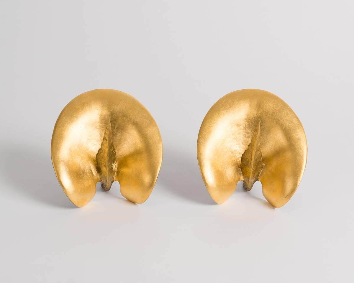 Pair of 24-carat gilt and patinated bronze candlesticks in the shape of cabbage leaves by Marc Bankowsky.

Stamped.