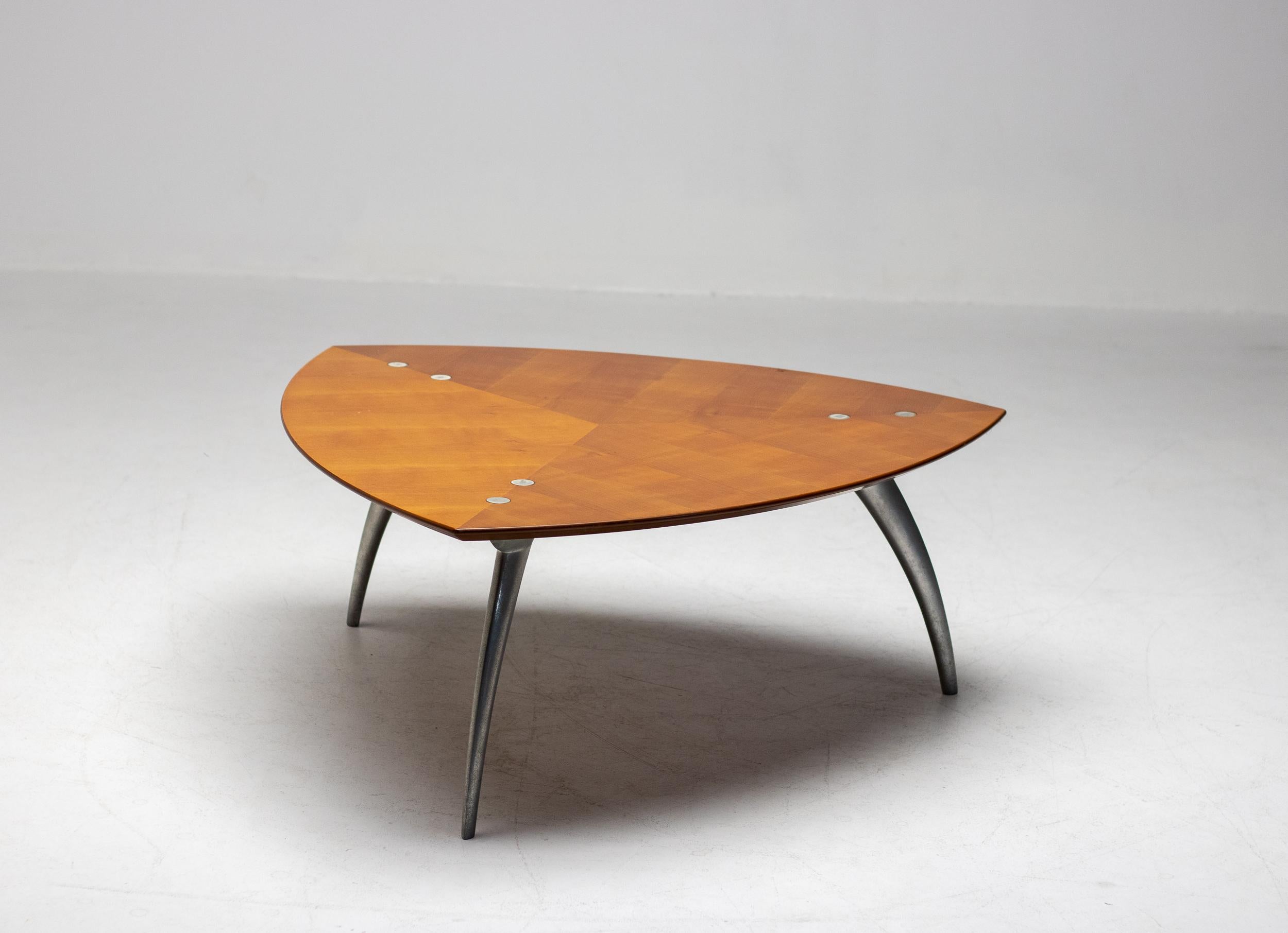 Striking, sculptural, and unmistakably contemporary, this “Tucano” coffee table by renowned French designer Marc Berthier exemplifies his playful yet impeccably considered approach to form. Produced in the 1990s, the piece balances bold geometry
