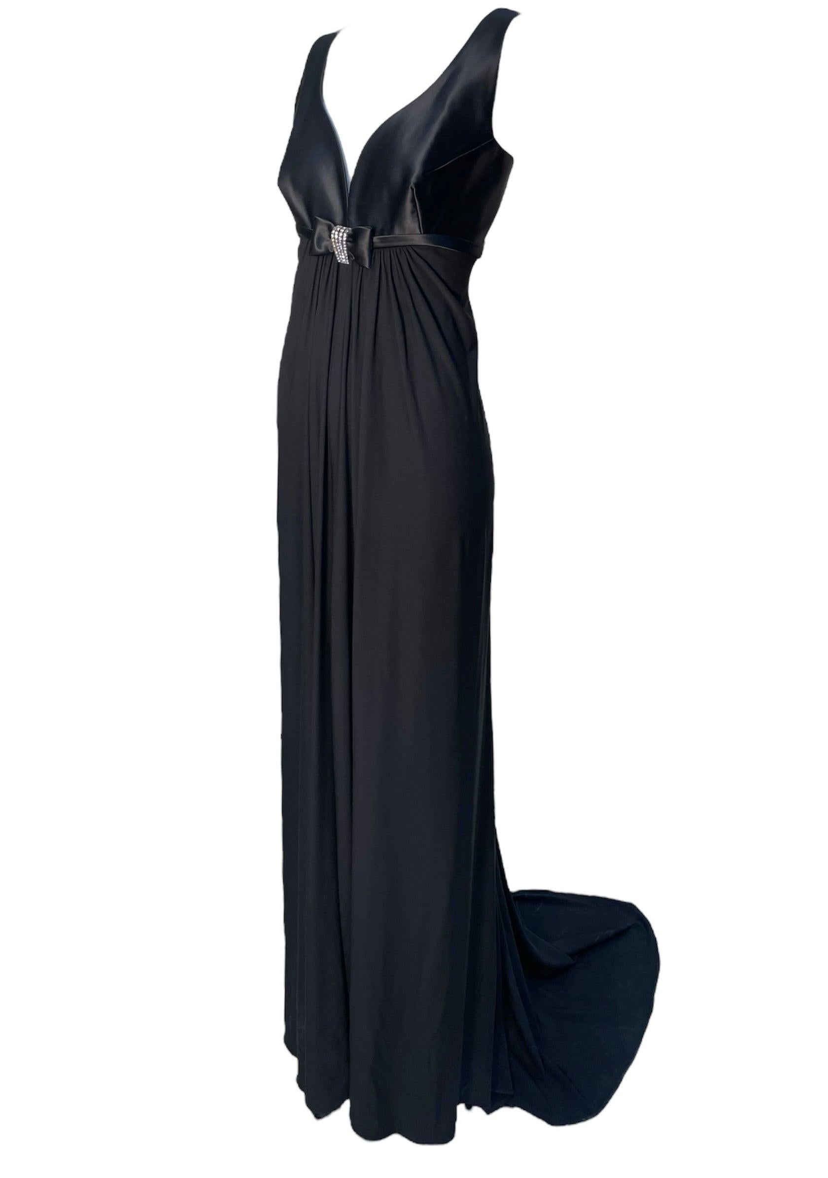 Si ce n'est pas cassé ! Une robe de soirée noire chic et intemporelle de Marc Bouwer. Depuis le début des années 2000, Bouwer est l'un des favoris des sirènes du tapis rouge. Cette robe incarne une époque de glamour hollywoodien, dont l'éclat ne