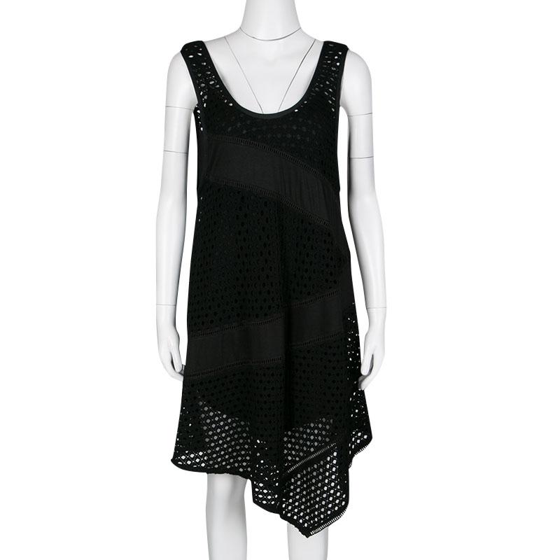 You are sure to love putting this dress on as it is well-designed to suit the mood of the season. This black dress is from Marc By Marc Jacobs and it carries a sleeveless style with eyelets all over and an asymmetric hem.

Includes: The Luxury