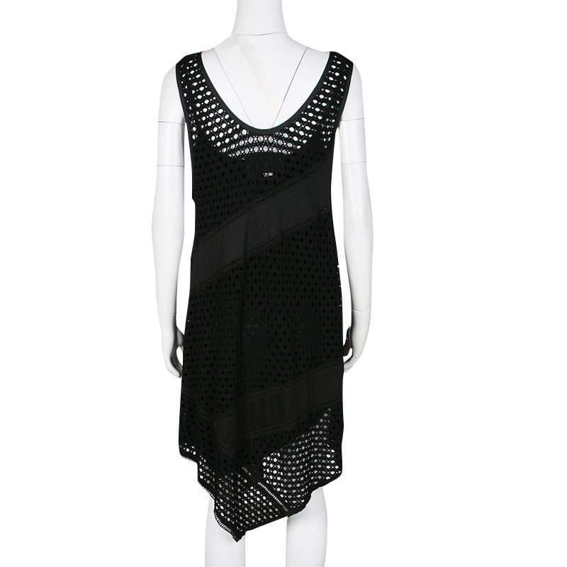 You are sure to love putting this dress on as it is well-designed to suit the mood of the season. This black dress is from Marc By Marc Jacobs and it carries a sleeveless style with eyelets all over and an asymmetric hem.

