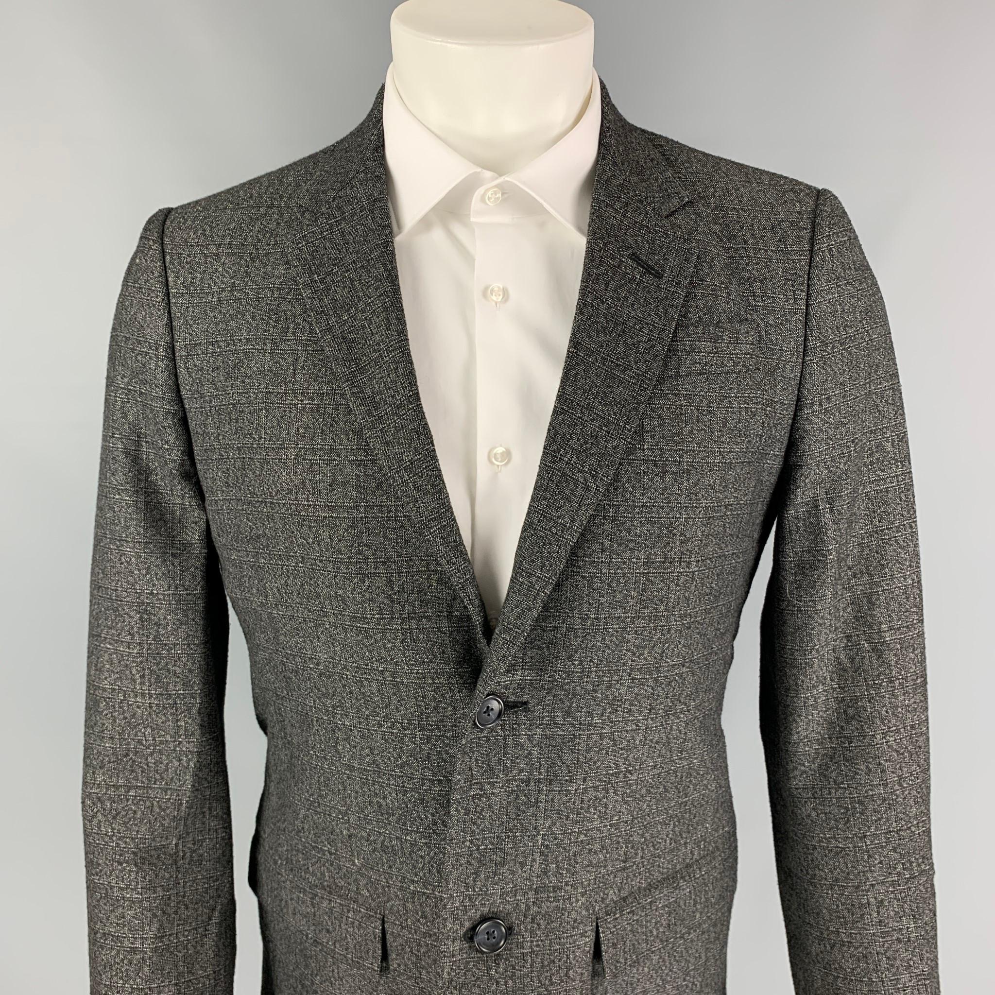 MARC by MARC JACOBS sport coat comes in a charcoal heather wool blend with a full liner featuring a notch lapel, flap pockets, and a double button closure. 

Very Good Pre-Owned Condition.
Marked: M

Measurements:

Shoulder: 17 in.
Chest: 38