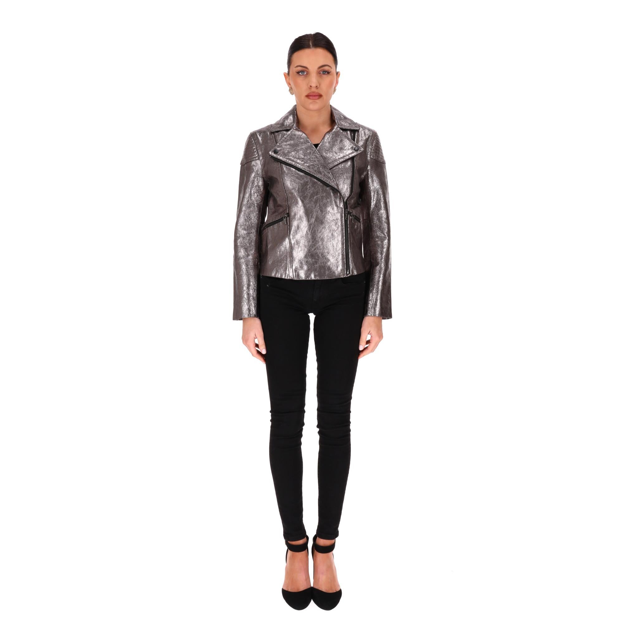 Marc By Marc Jacobs Metallic Leather Biker Jacket

Metallic grey/silver biker jacket crafted from calf leather.

Featuring asymmetric zip closure, side zipped pockets and lapelled collar.

Rrp Approx. £850

Size – S

Condition – Fair/Good (Some