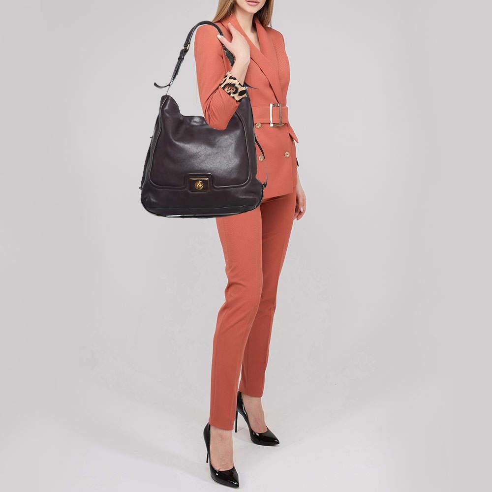 Stylish handbags never fail to make a fashionable impression. Make this designer hobo yours by pairing it with your sophisticated workwear as well as chic casual looks.
